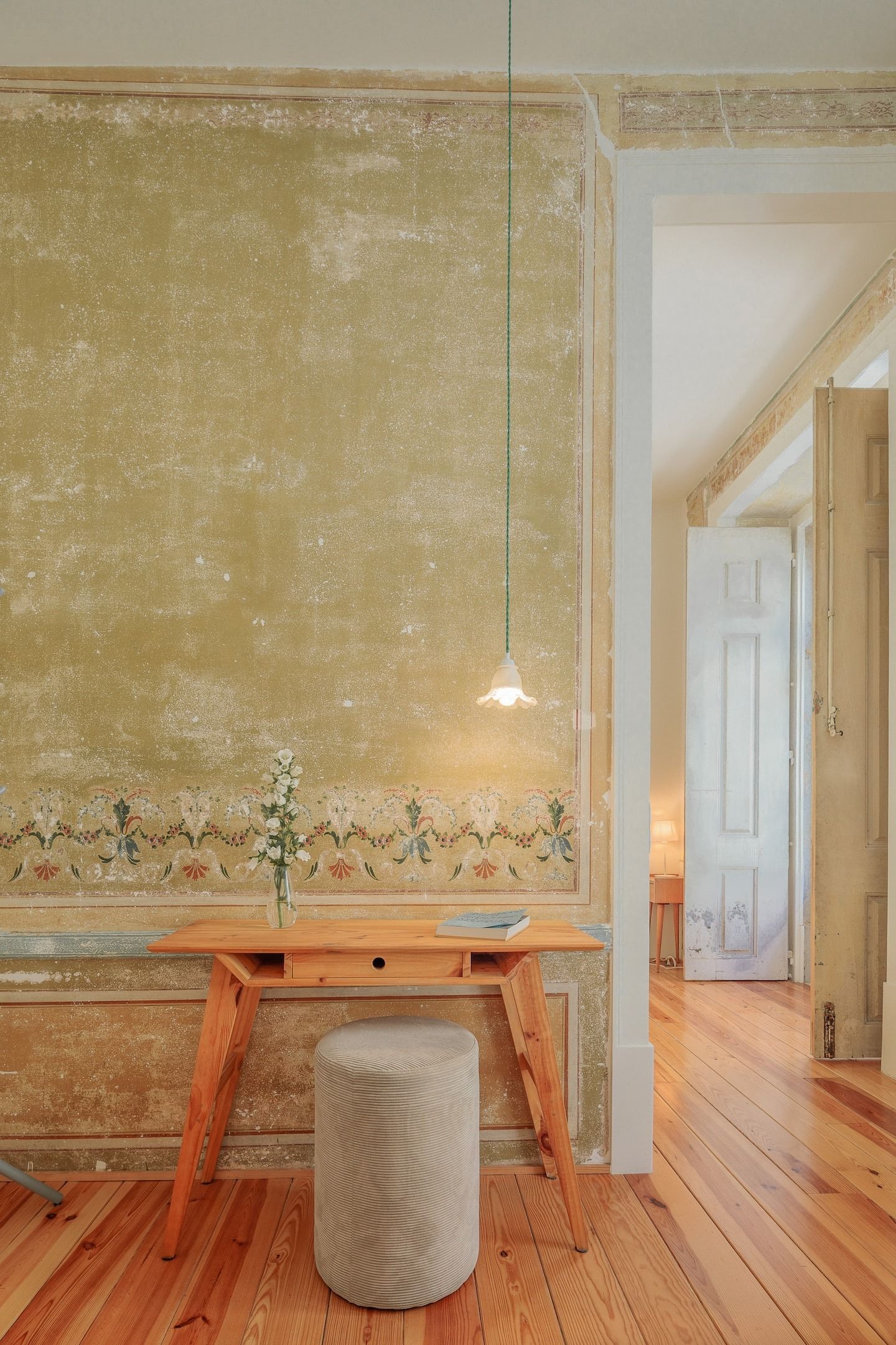 Image may contain interiors, interior design, home decor, books, publications and flooring