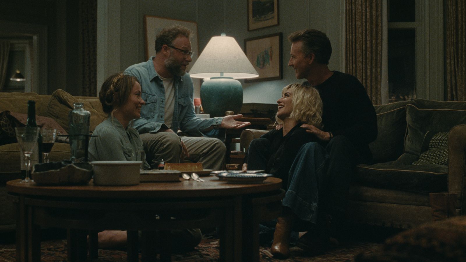 Image may contain Seth Rogen Edward Norton Penlope Cruz Lamp Table Lamp Face Avatar People Photography and Portraits