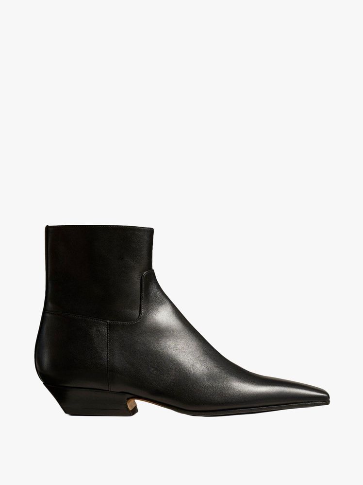 Image may contain: clothing, shoes and boots