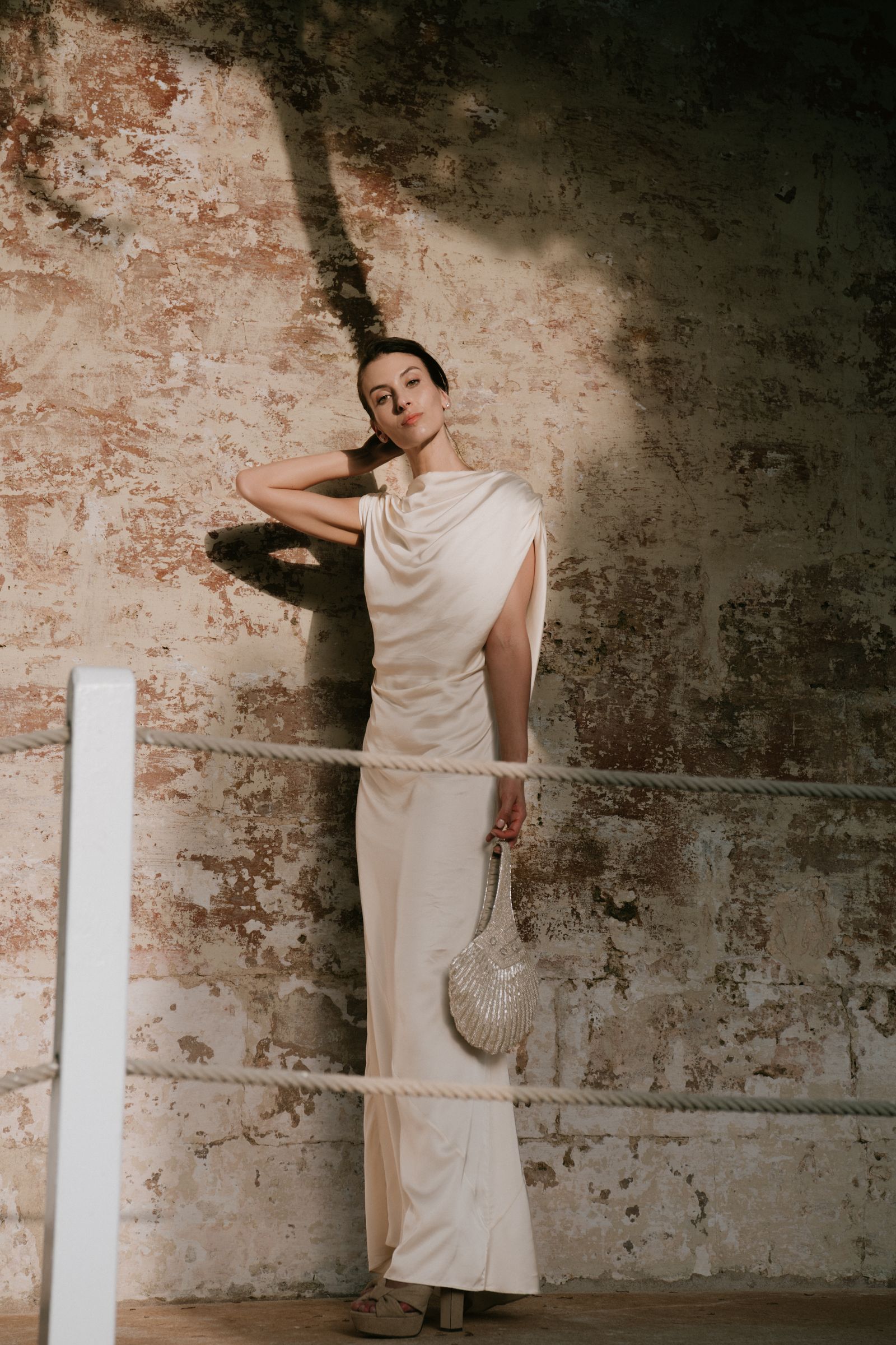 Image may contain clothing, sleeves, adult, wedding, head, accessories, bag, handbag, happiness and smile