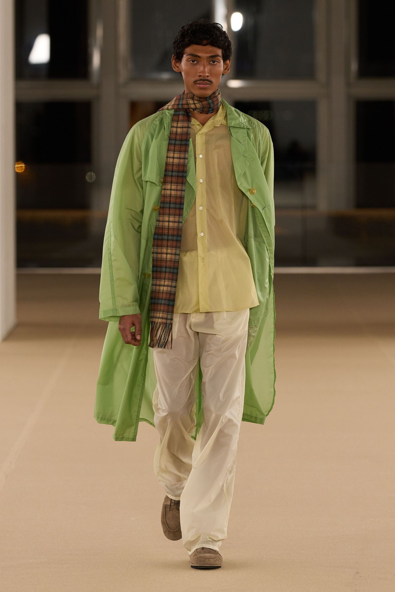 Image may contain clothing, coats, fashion adults and people