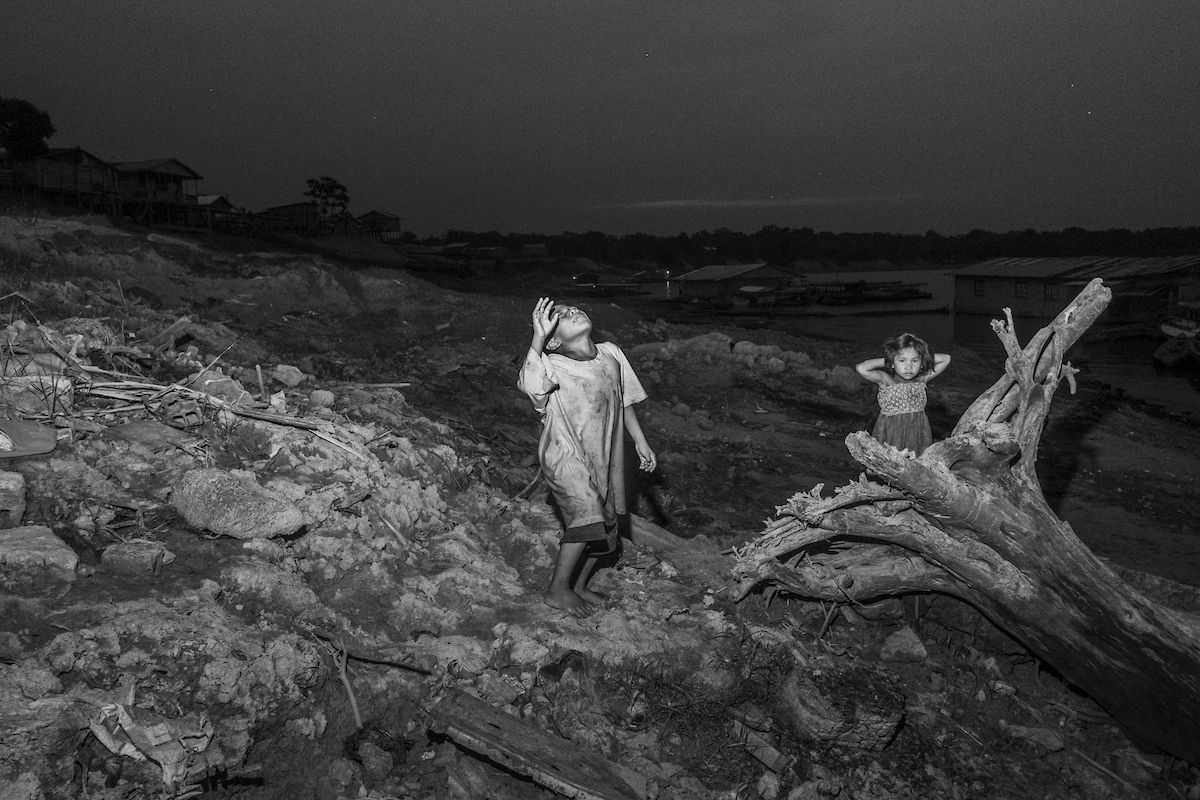 Images may contain faces, heads, people photography, portraits, soil, children, wood and rocks