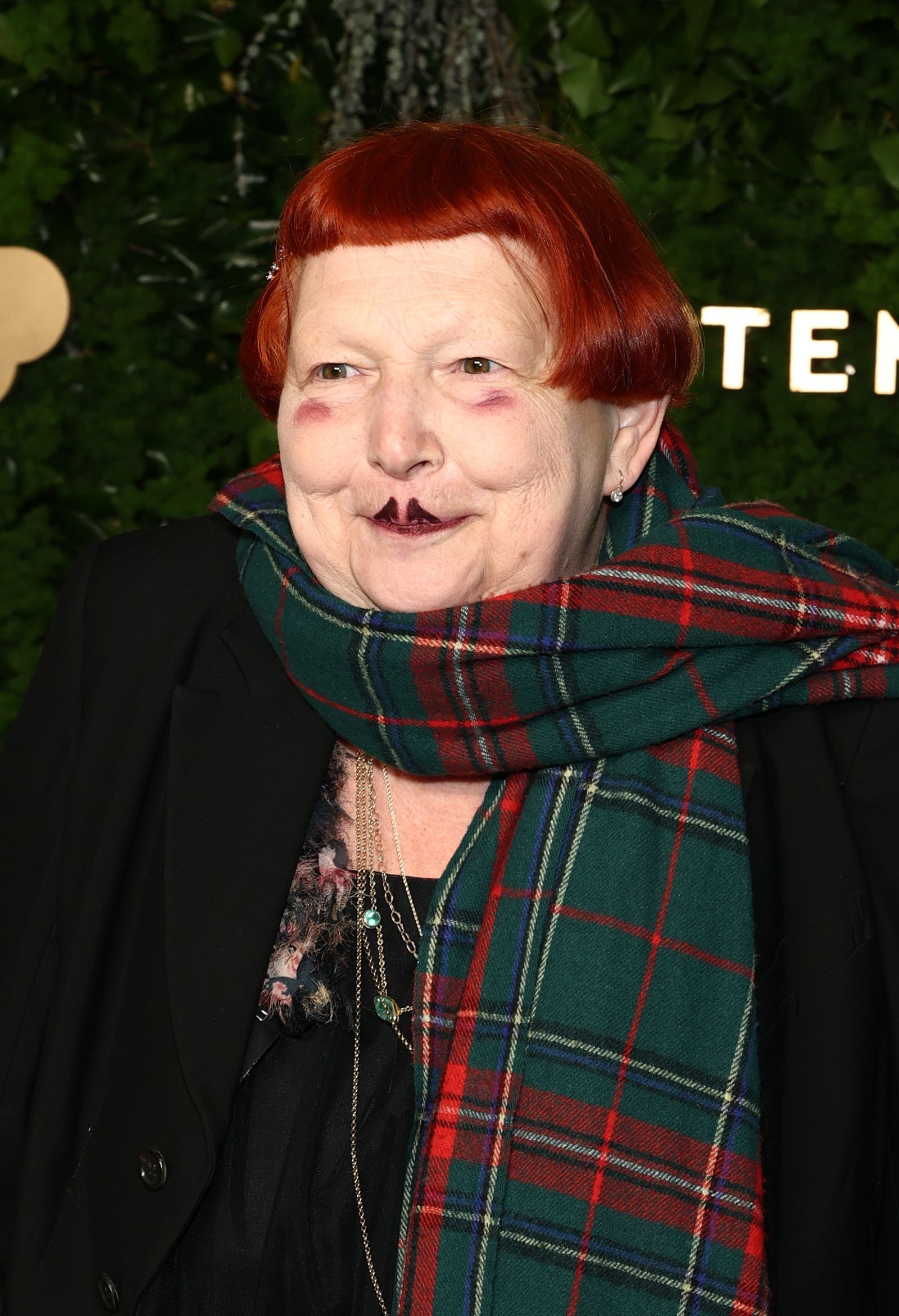 Images may contain faces, heads, people photography, portraits, clothing, coats, scarves, jackets and tartans