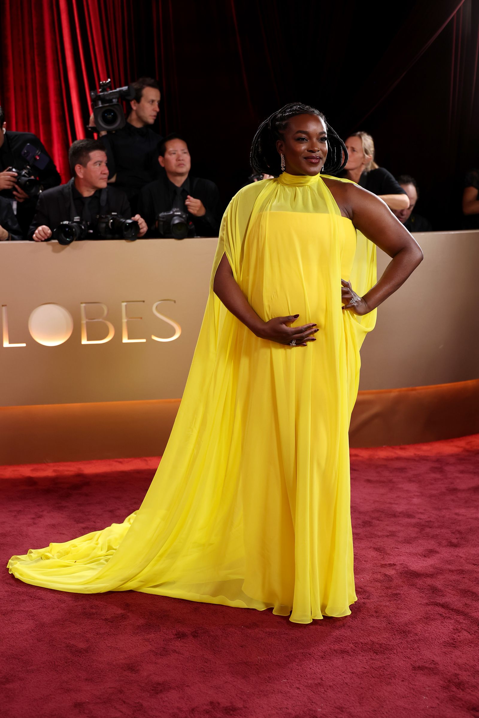 Image may contain Wunmi Mosaku Dyogo Henrique de Oliveira Fashion Adult Premiere Red Carpet face and head