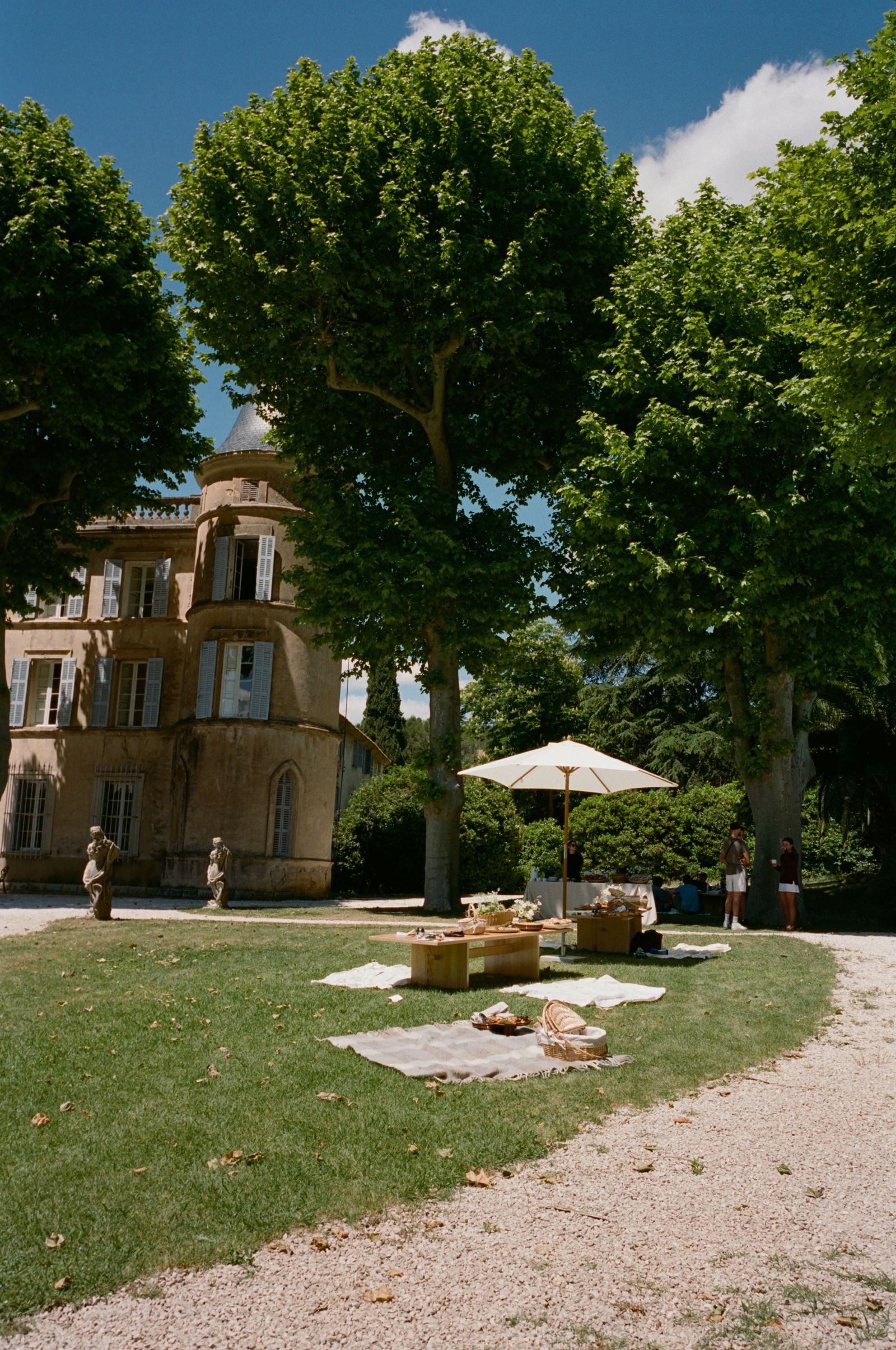 Image may contain grass, plant, tree, building, outdoor, shelter, nature park, oak tree, sycamore and house