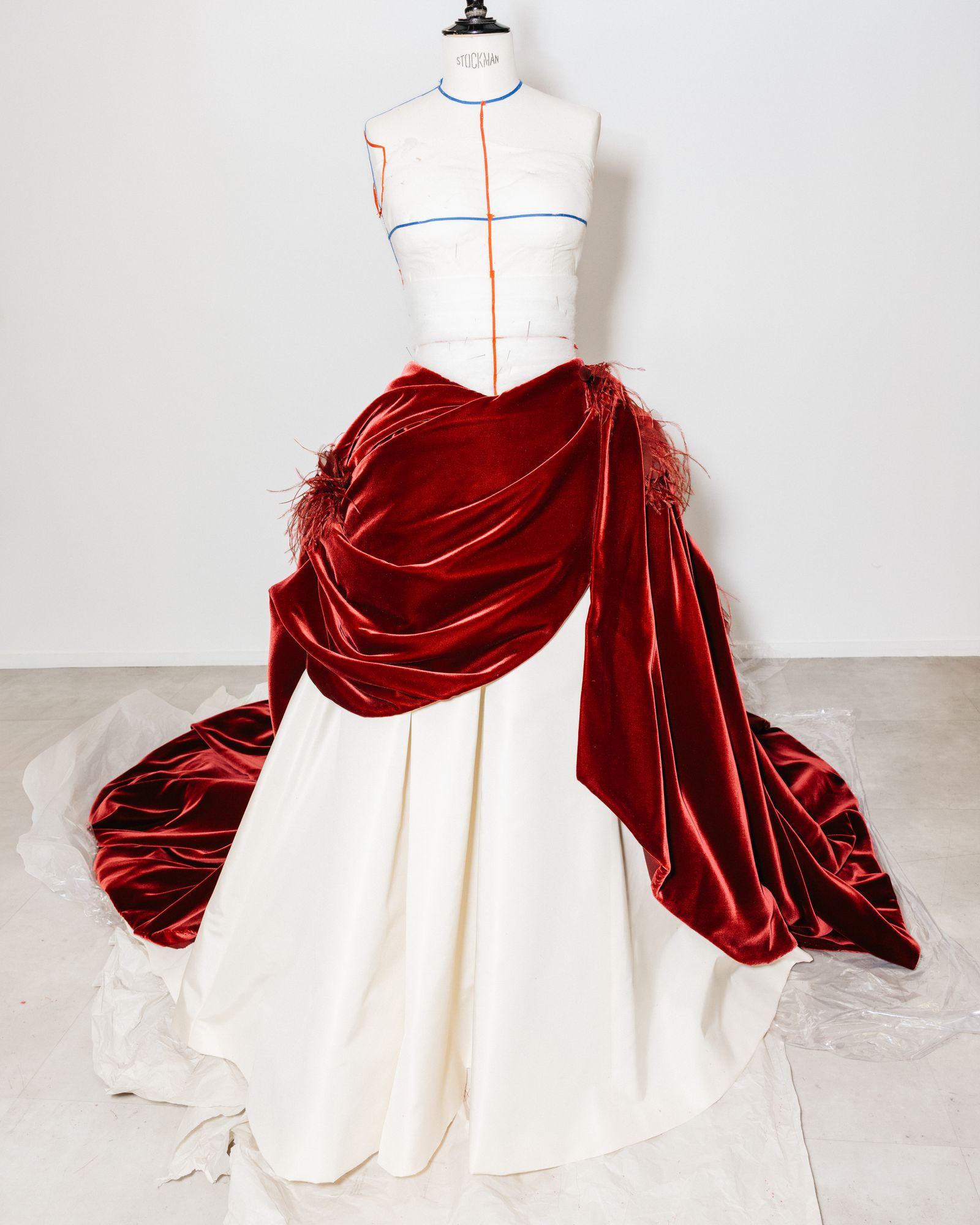 Image may contain clothing, dresses, velvet formal wear, adult and wedding