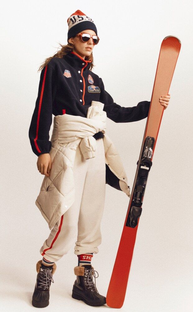 Image may contain clothing, coat, jacket, pants, outdoor, humanity, hat, hat and snow