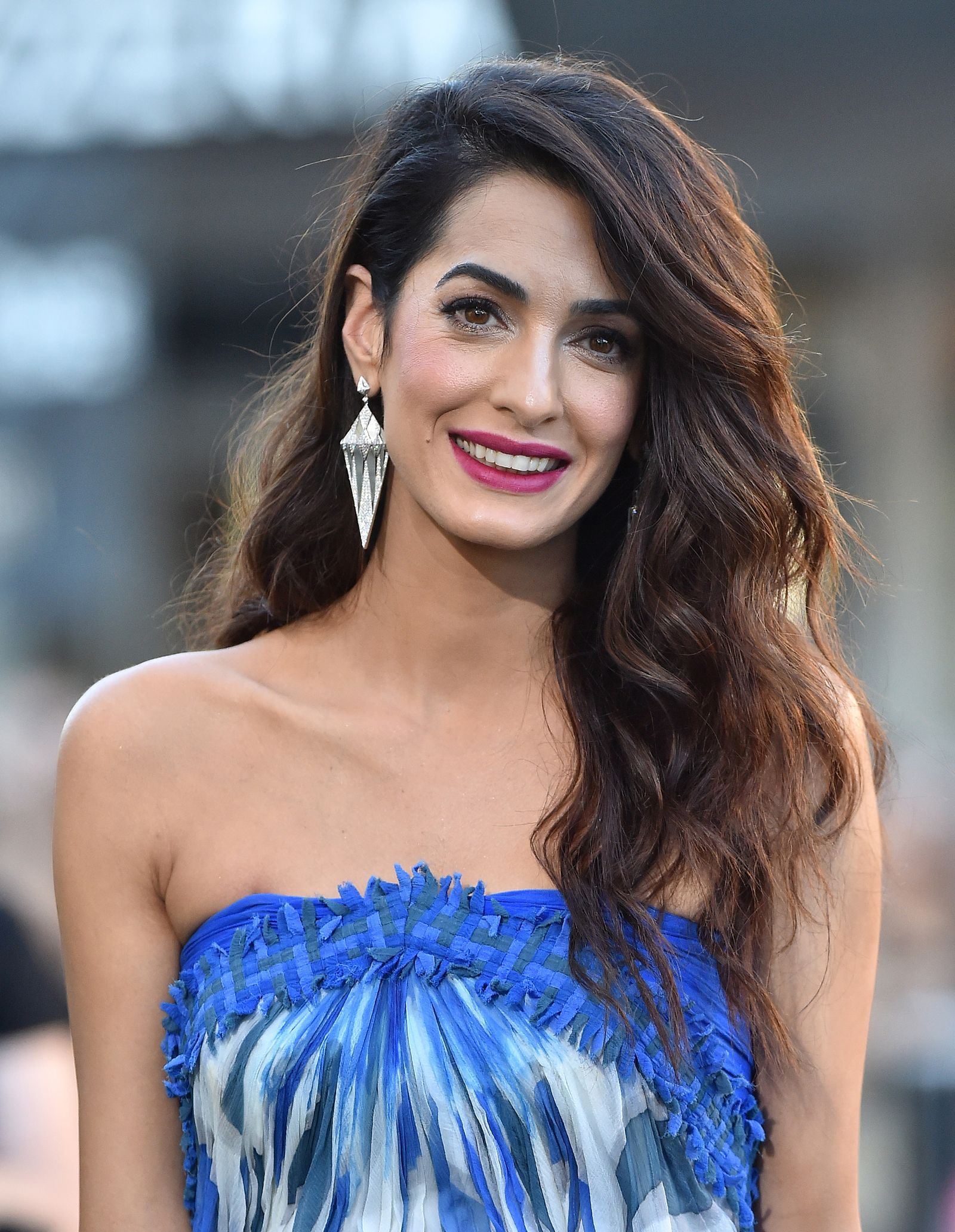 Image may contain evening gown, fashion clothing, gown, gown, person, Amal Clooney and face