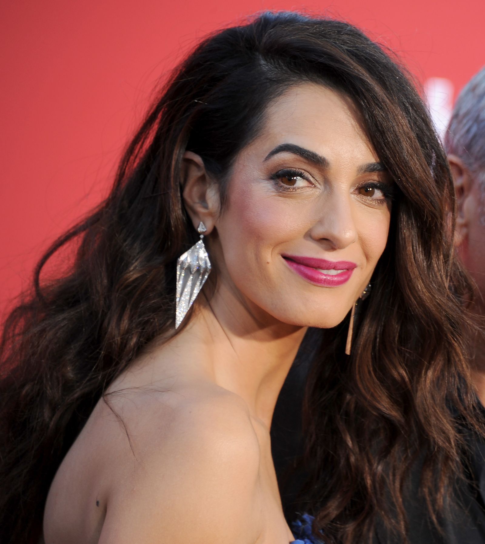 Image may contain the face Amal Clooney and hair