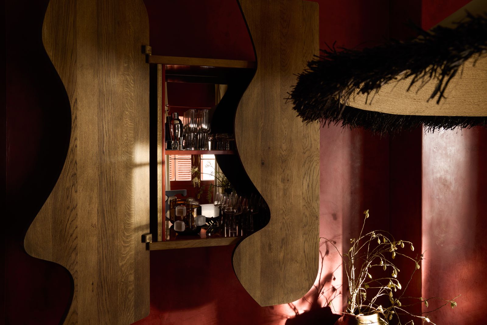 Image may contain bar interior design, wooden alcohol bar, bar counter, drinks and furniture