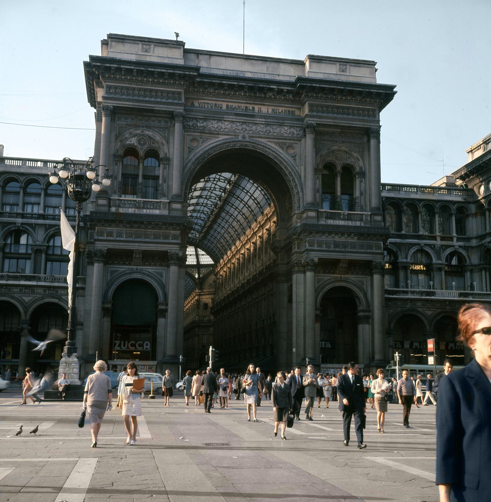 Image may contain Person Accessories Bag Handbag Architecture Building Clothing Footwear Shoe and Light