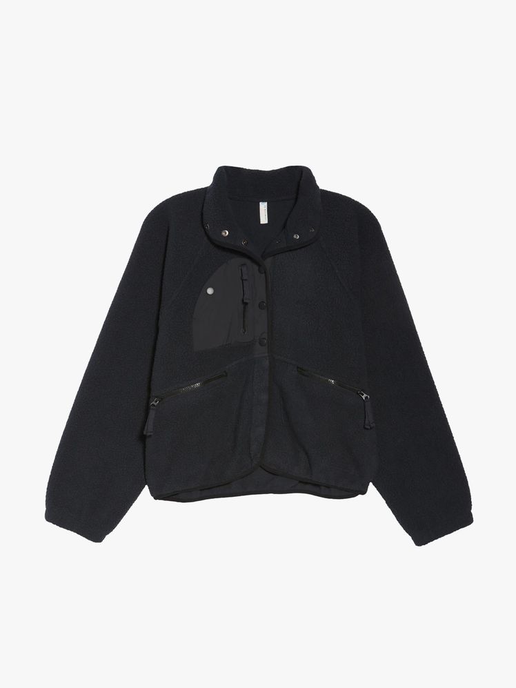 Image may contain: clothing, wool, coat, jacket, knitwear, sweater, long sleeves and sleeves