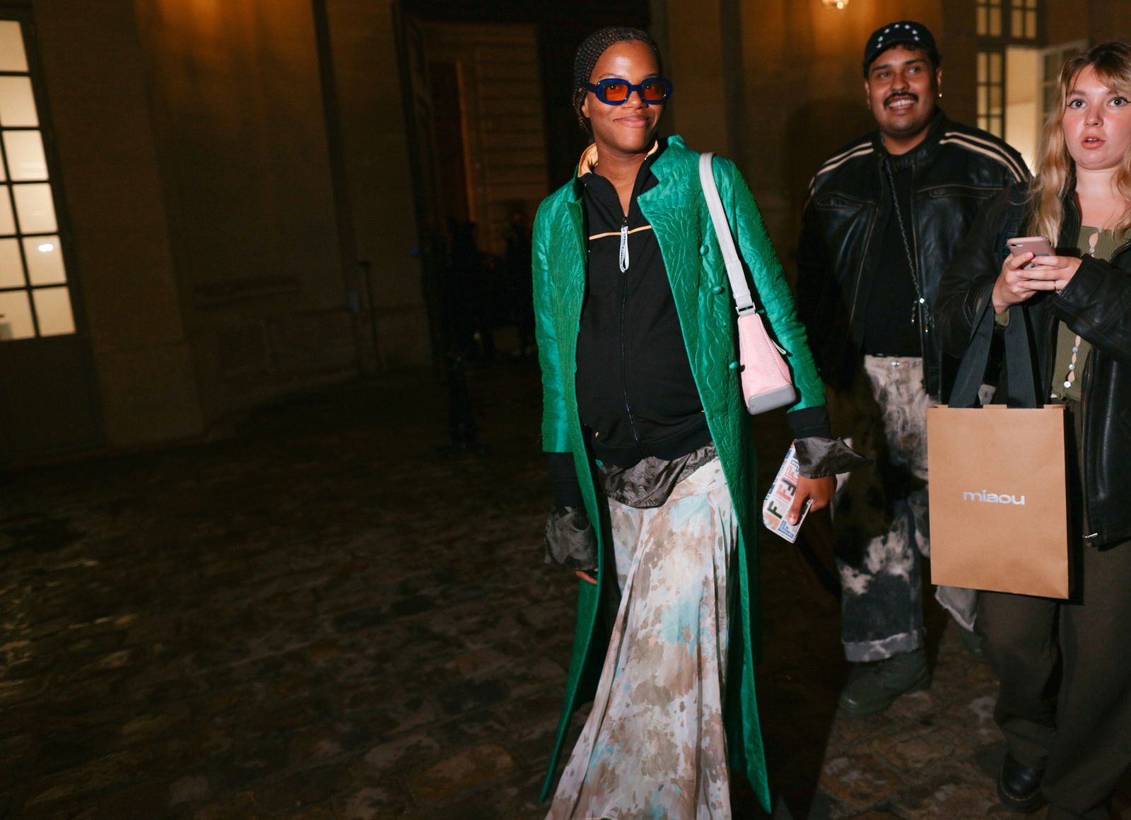 Image may contain clothing, jackets, coats, people, sunglasses, accessories, accessories and sleeves