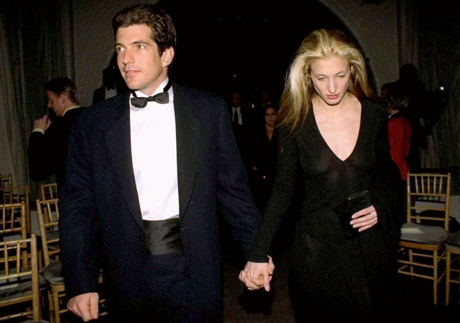 Image may contain John F. Kennedy Jr. Carolyn BessetteKennedy Bess Motta clothing formal suit and body parts
