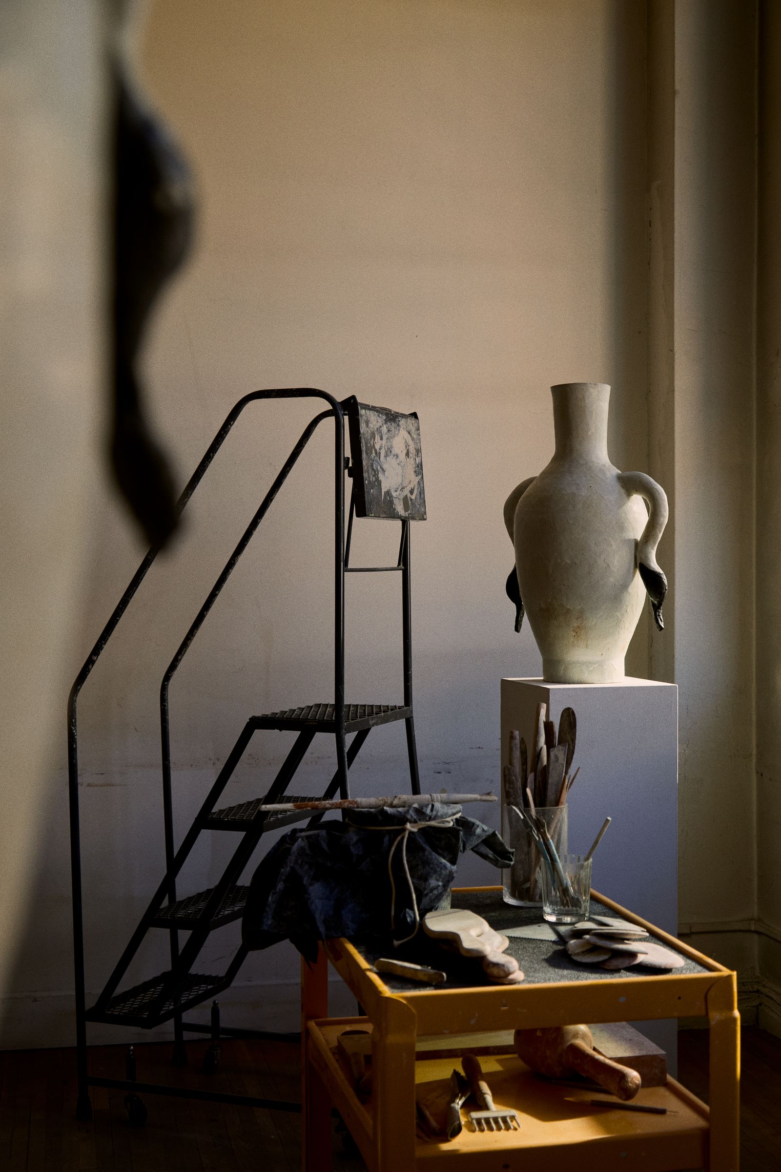 Image may contain lamps and cups