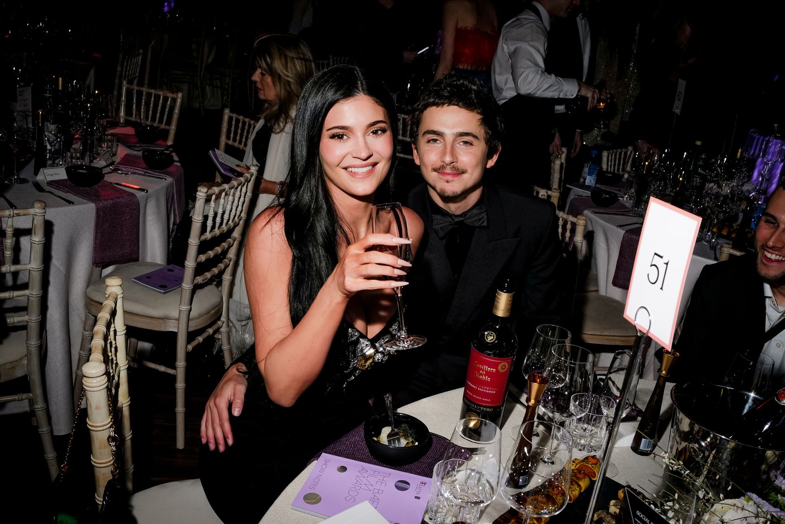 Image may contain Kylie Jenner Timothe Chalamet Carole Ashby Urban Fun Party Adult Wedding face and head