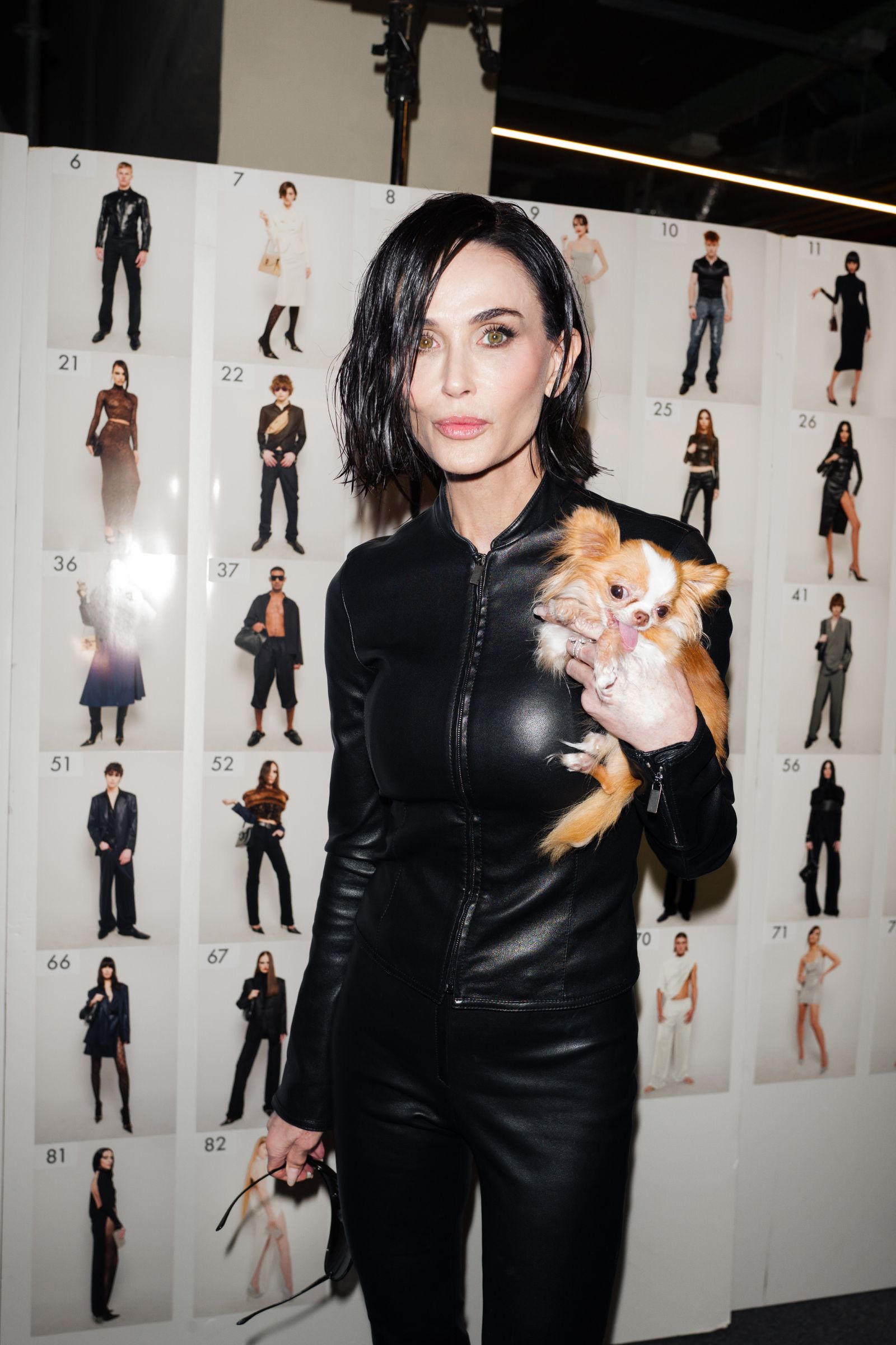 Image may contain Demi Moore Black Hair Hair People Adult Clothing Coats Jackets Face Head Photography and Portraits