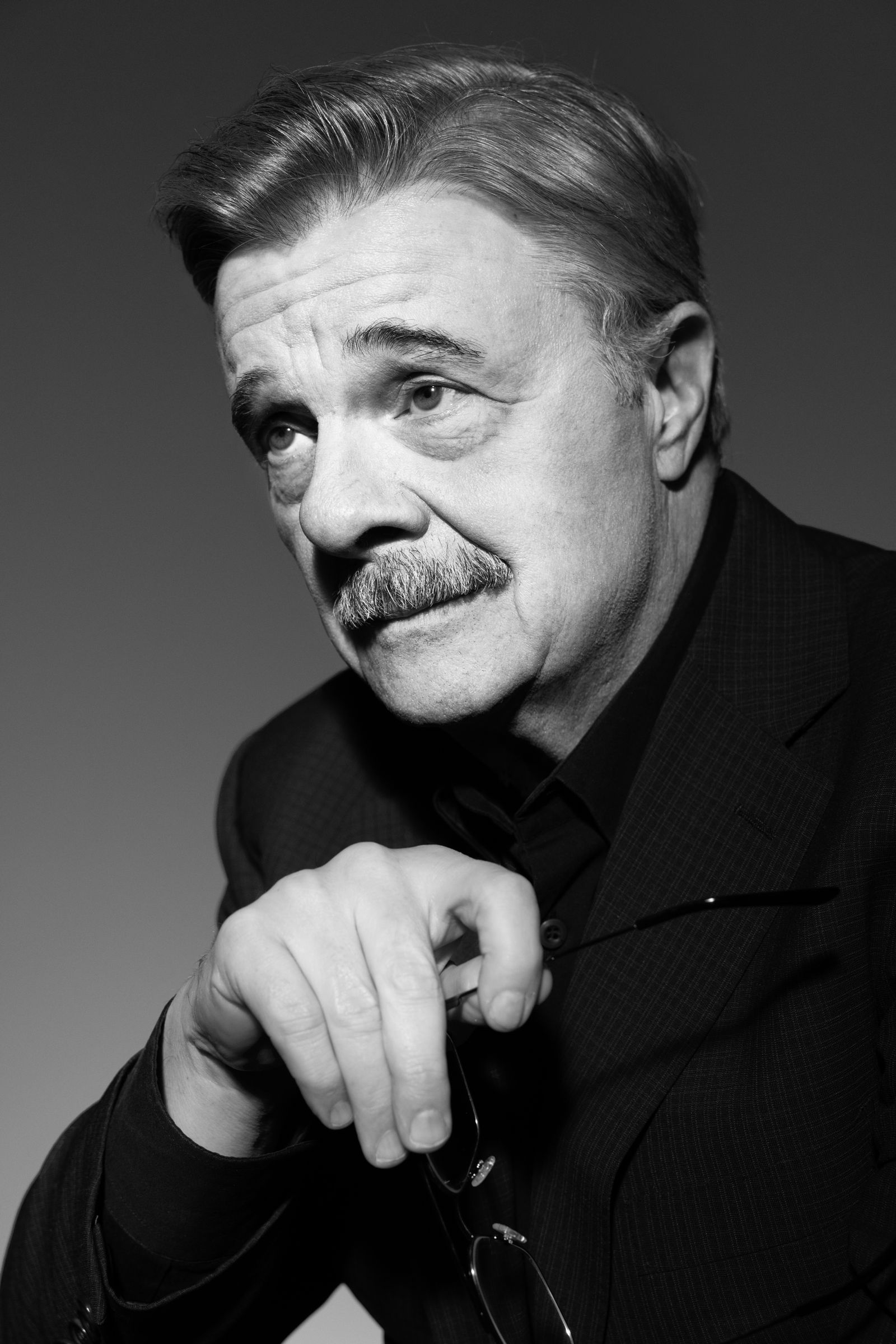 Image may contain Nathan Lane face, avatar, people photography, portrait, body parts, fingers, hands, adult, happy and smiling