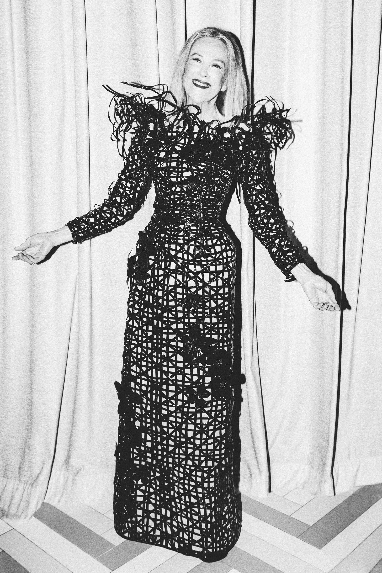 Image may contain Catherine O'Hara face, head, people photography, portrait, clothing, long sleeves and body parts