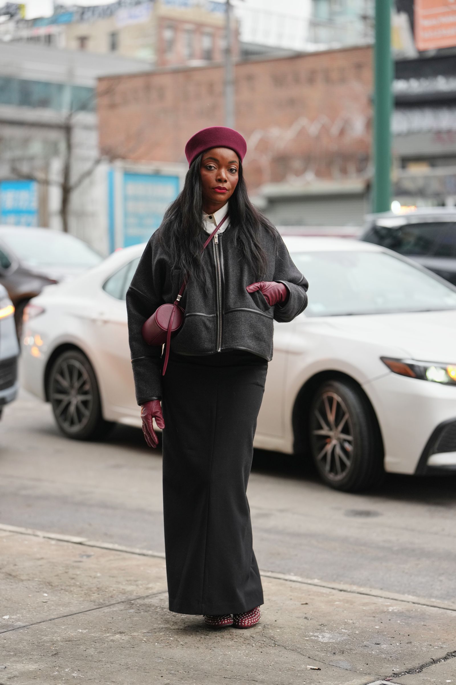 Image may contain Bimbo Akintola Clothing Gloves Adults Pedestrians Cars Traffic Vehicles Face and Head
