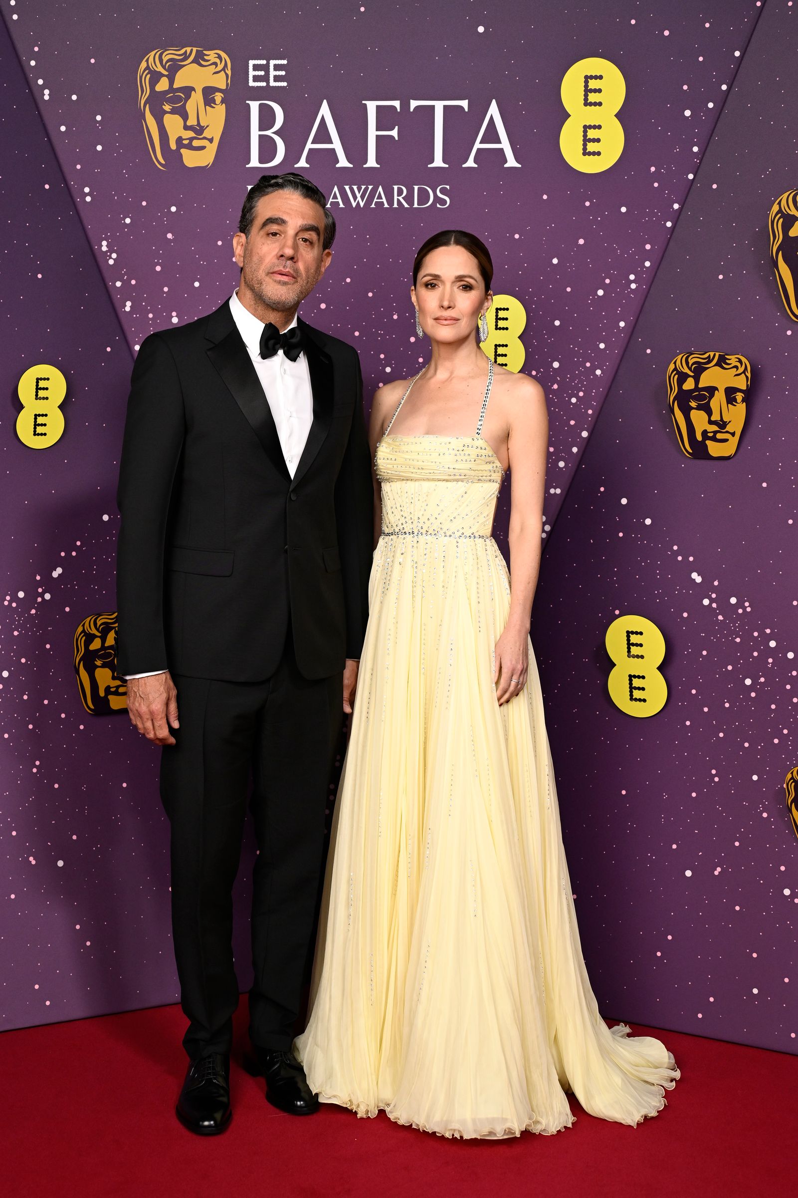Image may contain Bobby Cannavale Rose Byrne Fashion Adult Wedding Formal Outfit Suit Face and Head