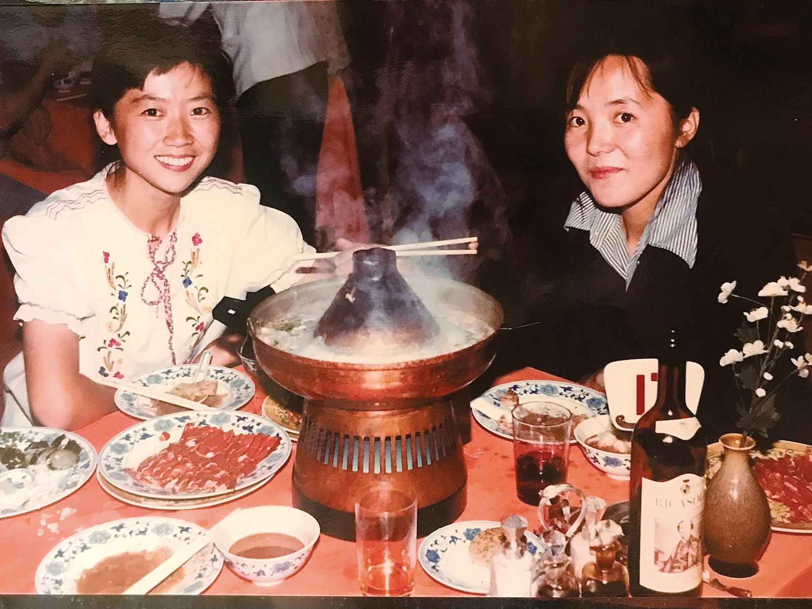 Image may contain dishes food meal stew adults children face city wedding meat mutton hotpot and plate