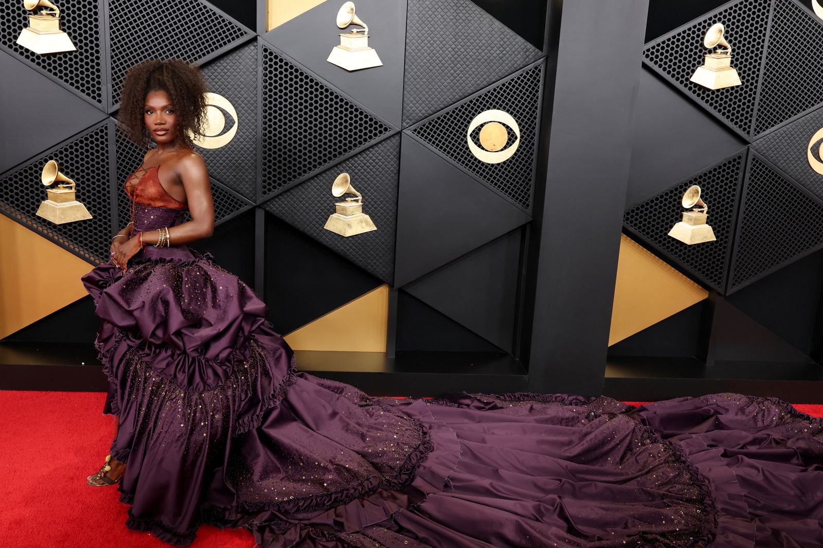 Image may contain clothing, gowns, formal wear, fashion gowns, dressing room, interior interior design and furniture