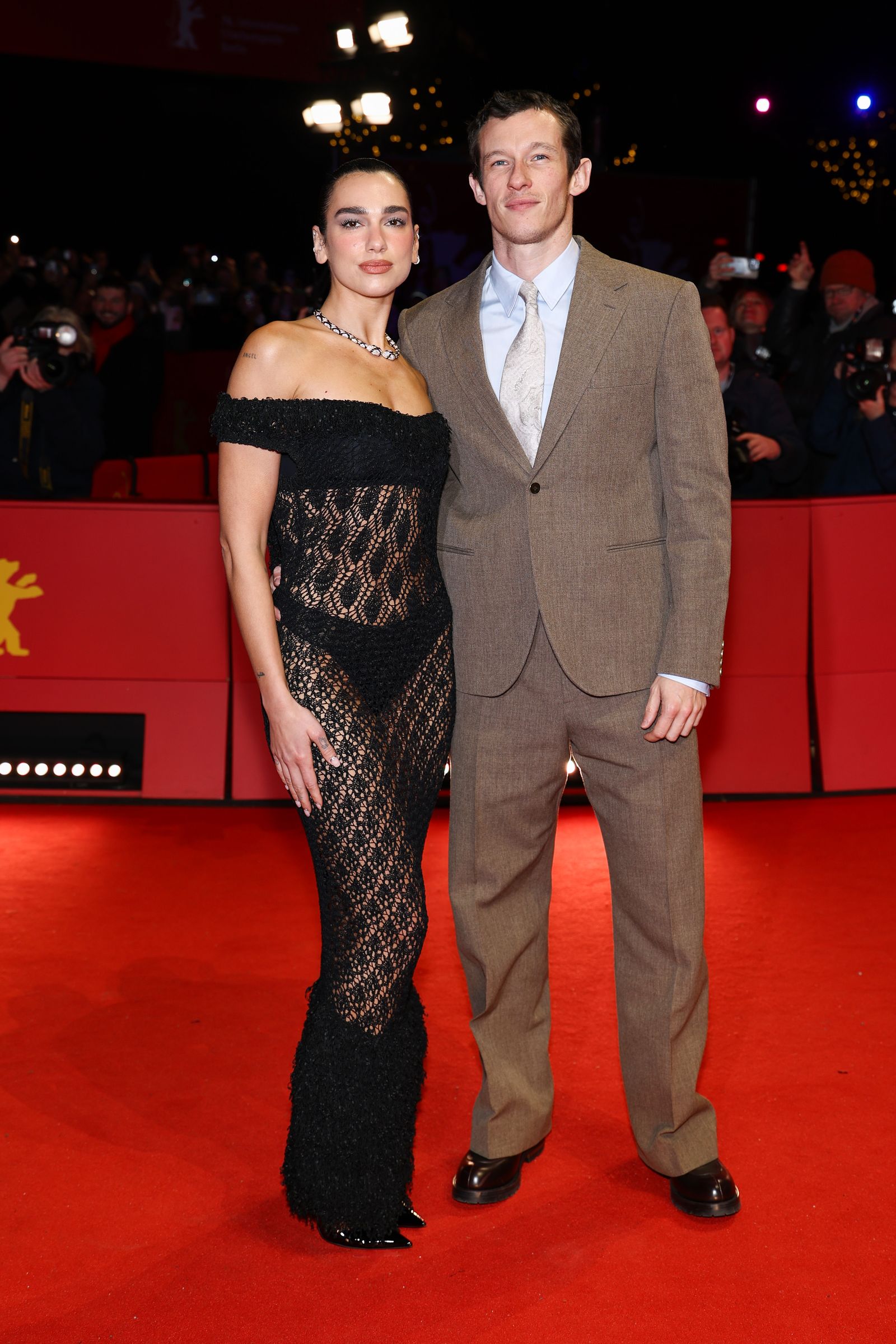 Dua Lipa and Callum Turner attend the Rose Pruning premiere during the 76th Berlin International Film Festival…