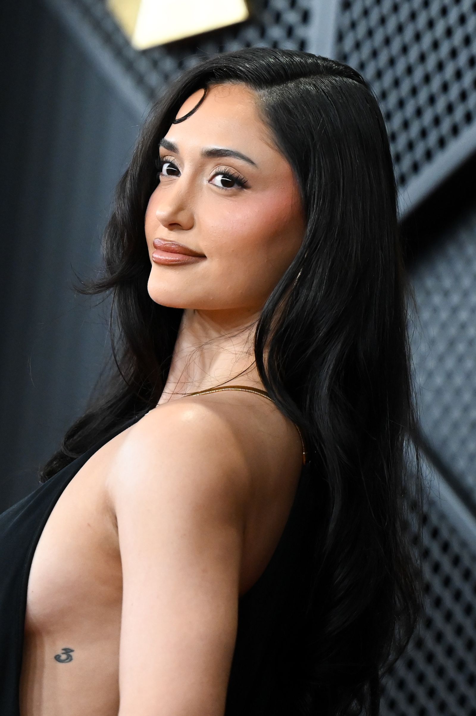 Image may contain black hair, adult head and face photography and portraits