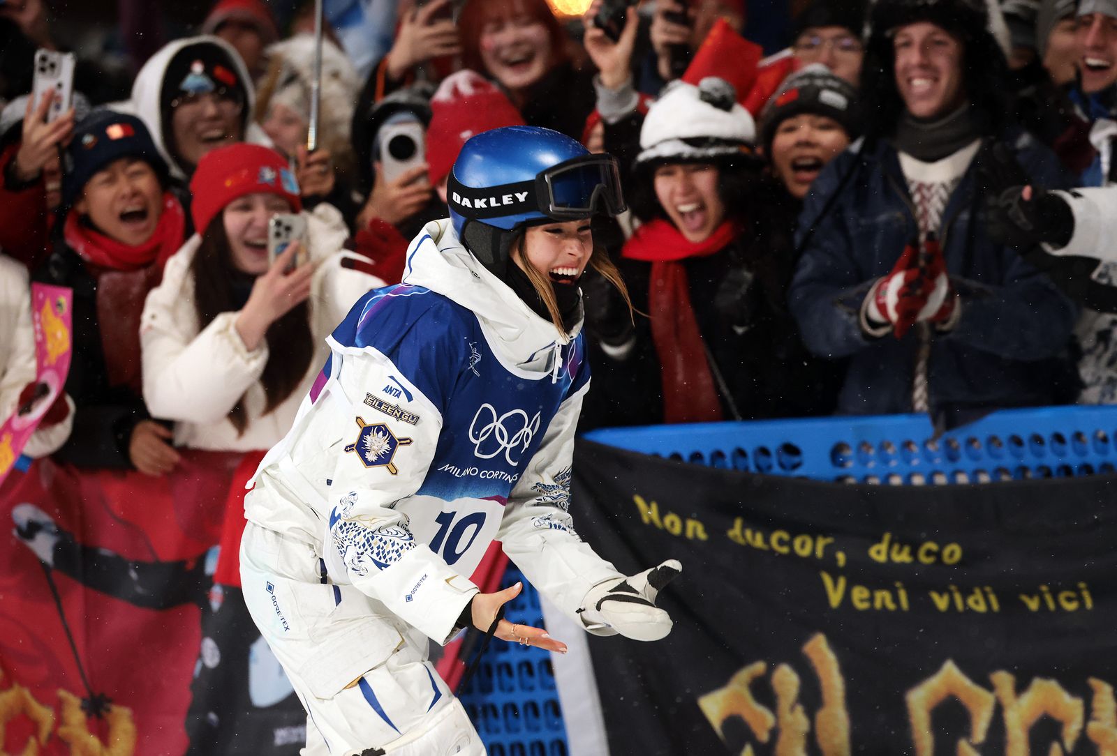 Image may contain La Parka Helmet face, adult outdoor and people