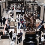 An atrium where people walk through.