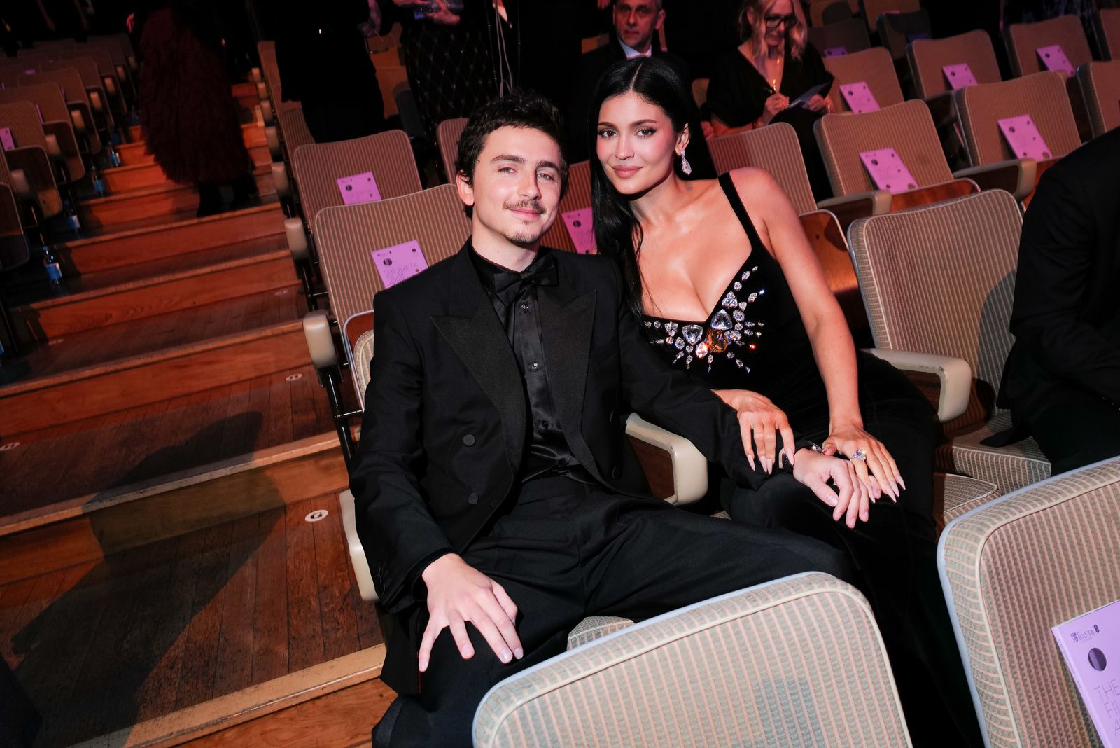 Image may contain Timothe Chalamet Kylie Jenner Adult Photobombing Fashion Outfits Formal Dresses and Suits