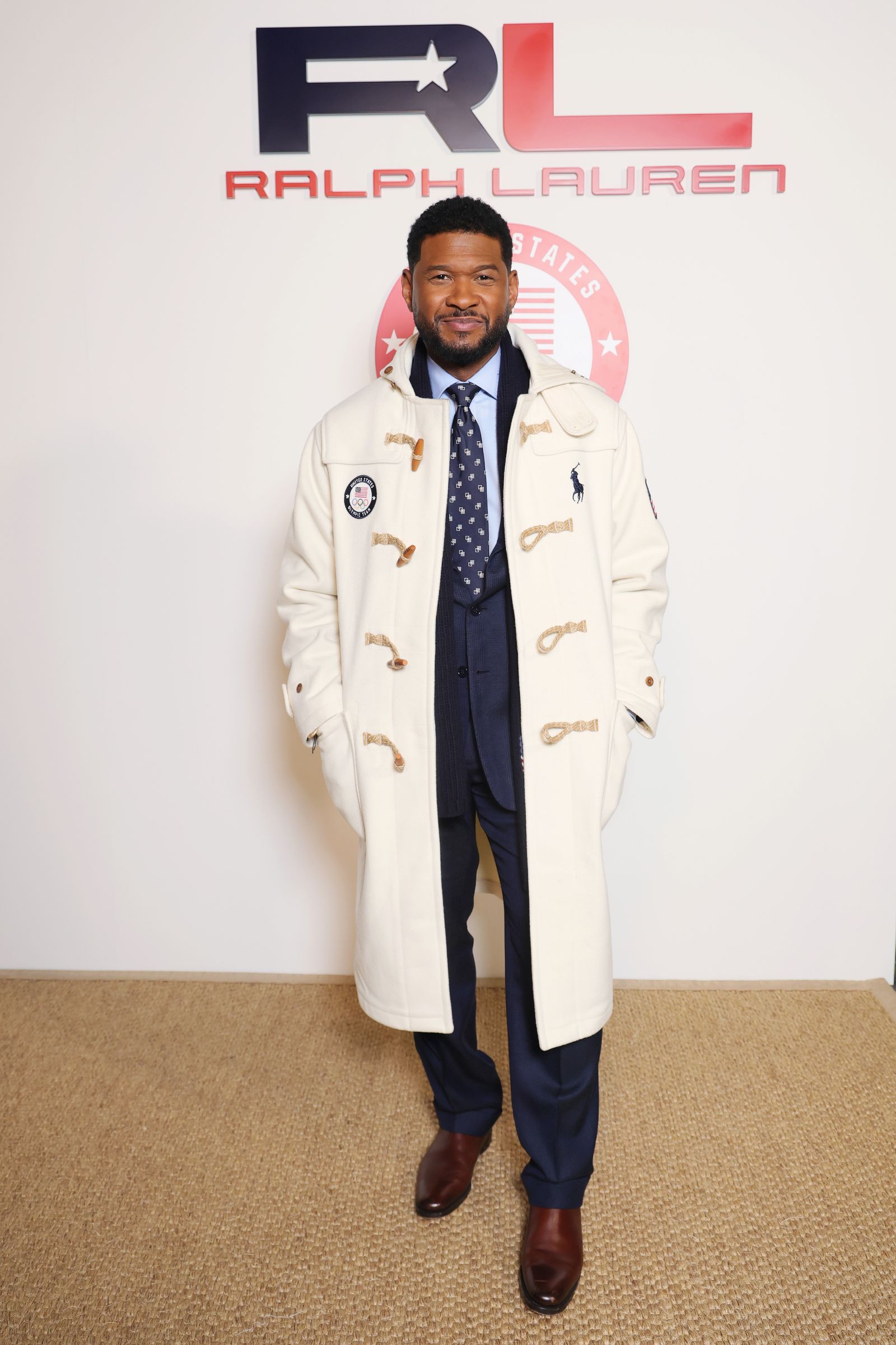 Image may contain Usher clothing and outerwear
