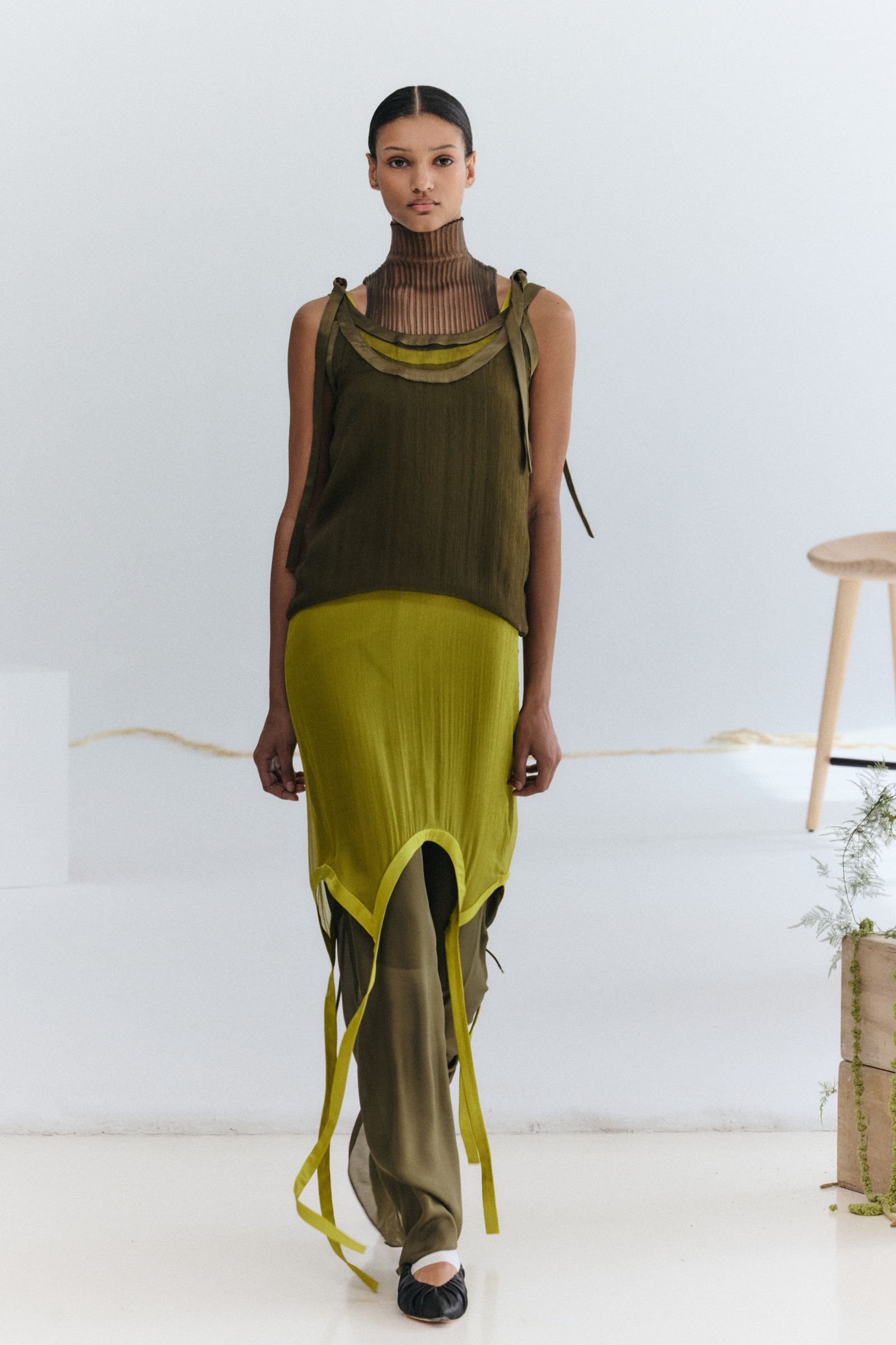 Image may contain shirts, apparel, adult, dresses, sleeves and pants