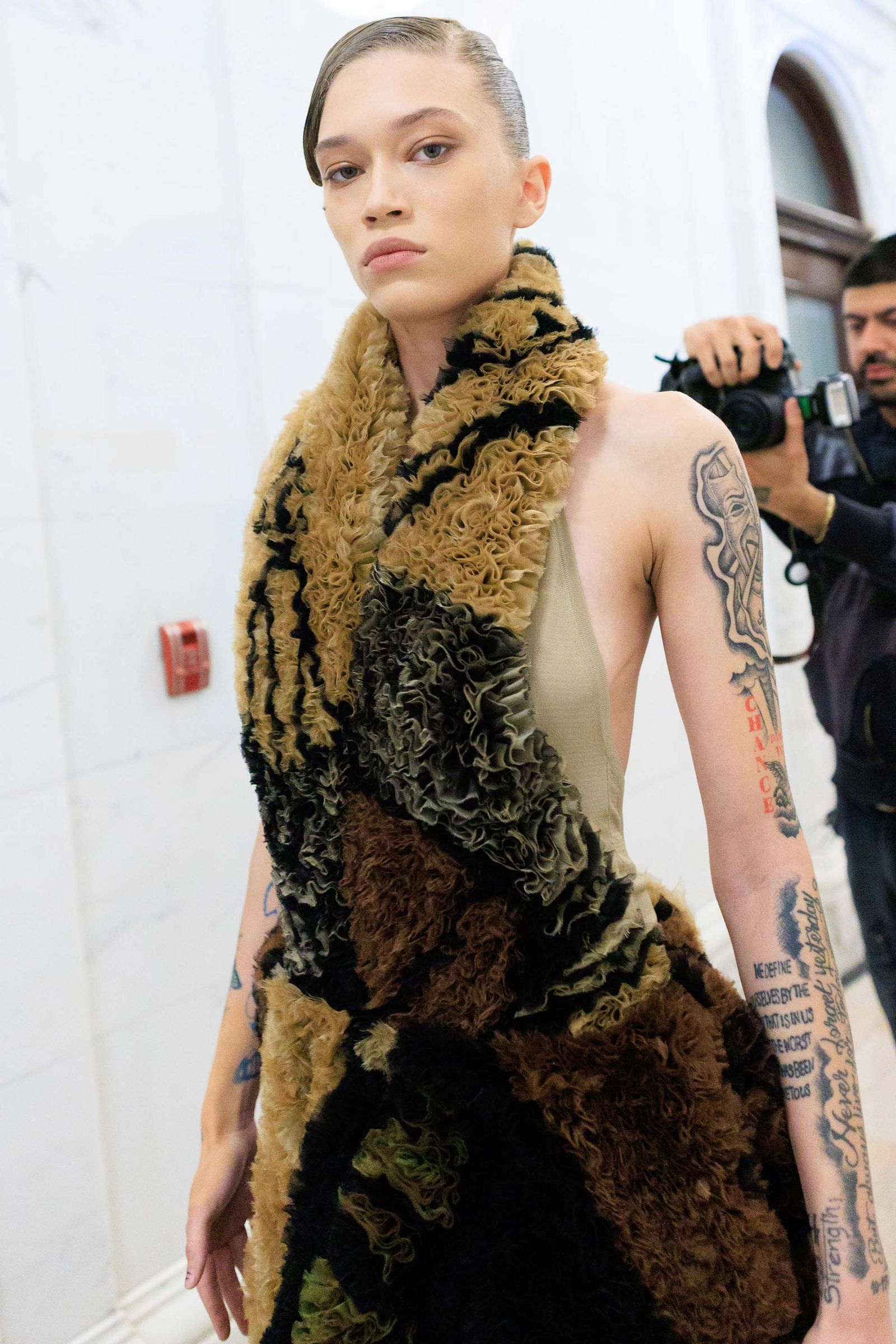 Image may contain Hannah Ferguson adult, clothing, scarves, skin and tattoos