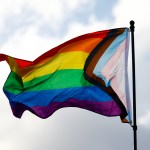 Flag with rainbow colors.