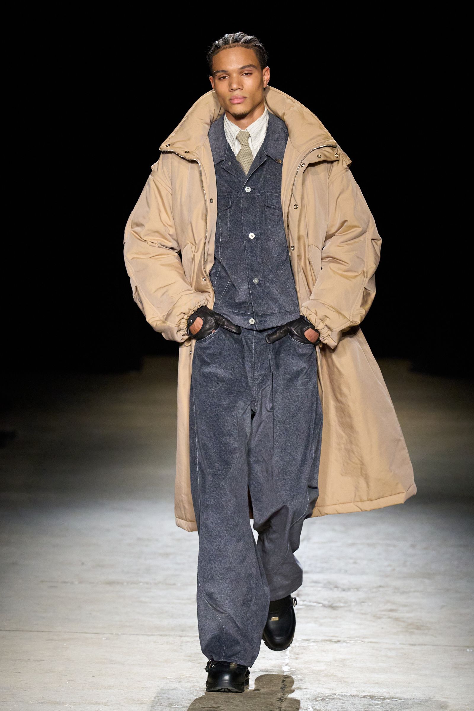 Image may contain clothing, coats, fashionable adult gloves, coats, accessories, formal suits and ties