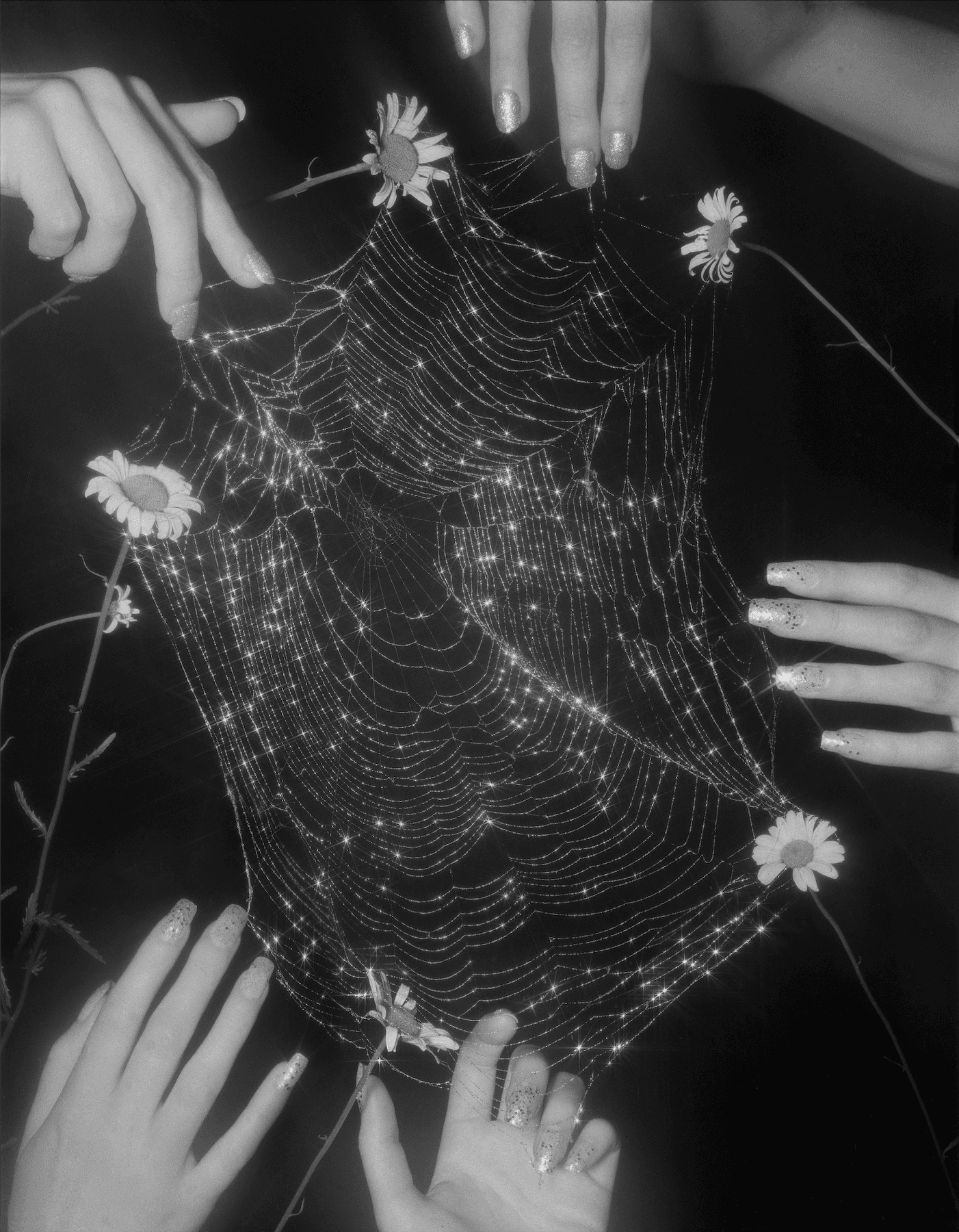 Image may contain body parts, fingers, hands, adults and spider webs