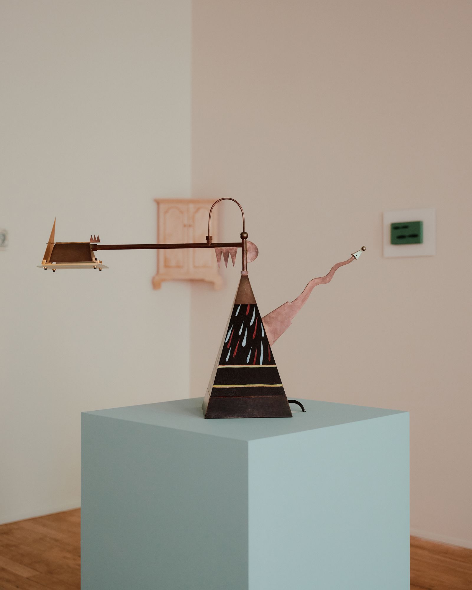 Image may contain lamps, clothing and hats