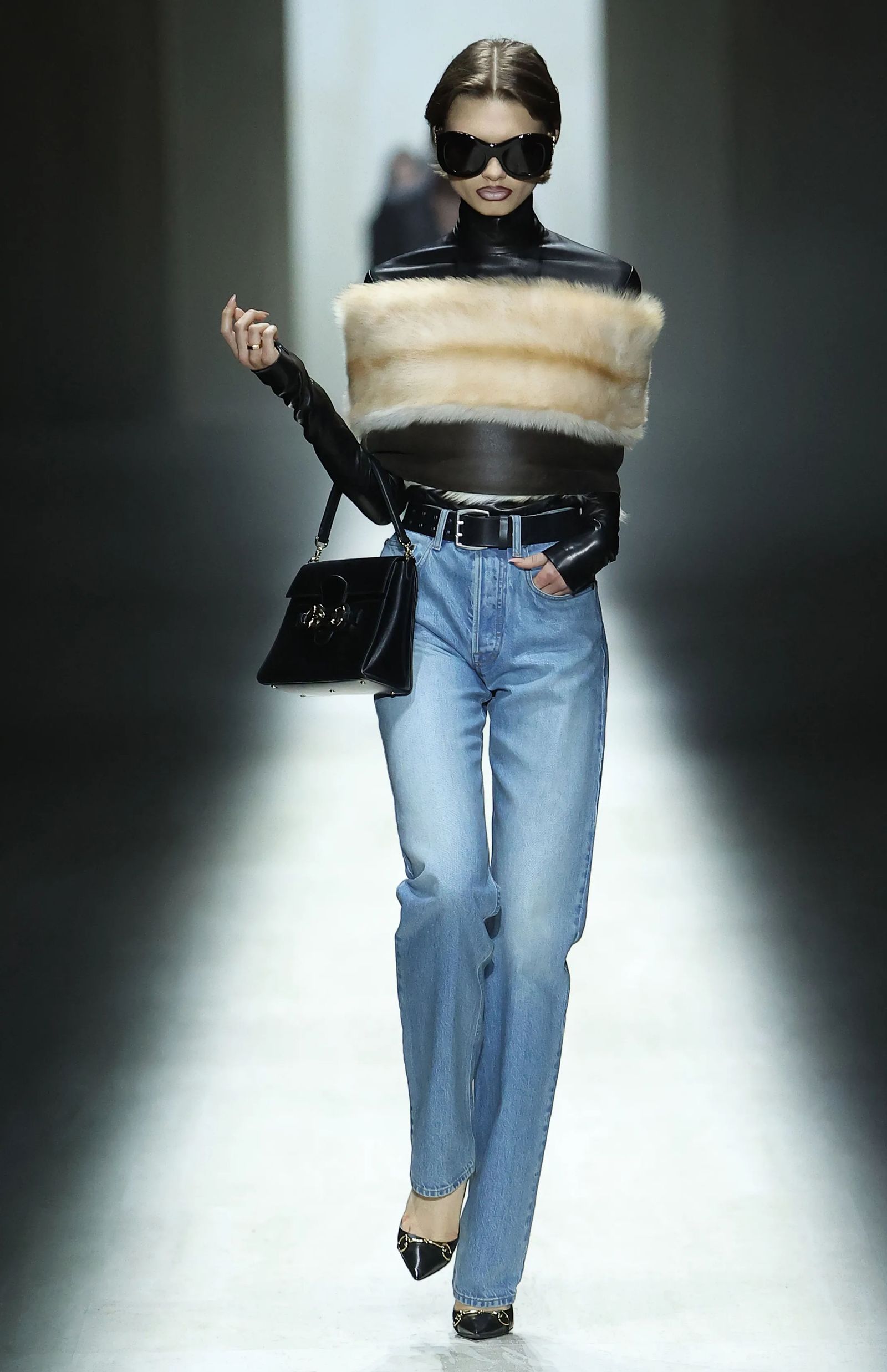 Image may contain clothing, pants, jeans, adult accessories, bags, handbags, capes and gloves