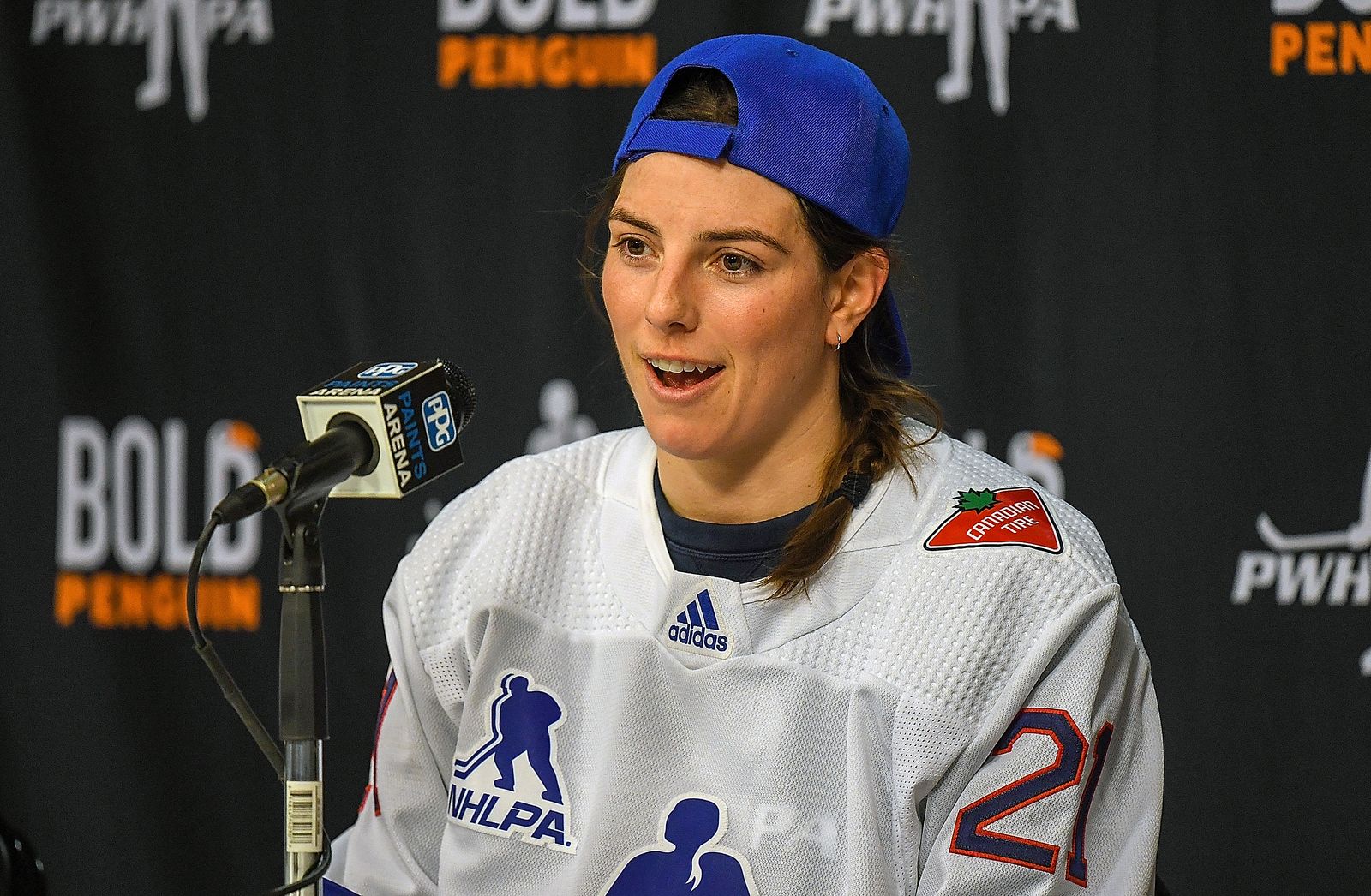 Image may contain Hilary Knight people baseball cap hat clothing hat crowd adult head and face