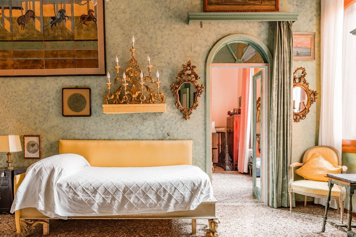 Images may contain chandeliers, lamps, beds, furniture, interior interior design, home decor and candles