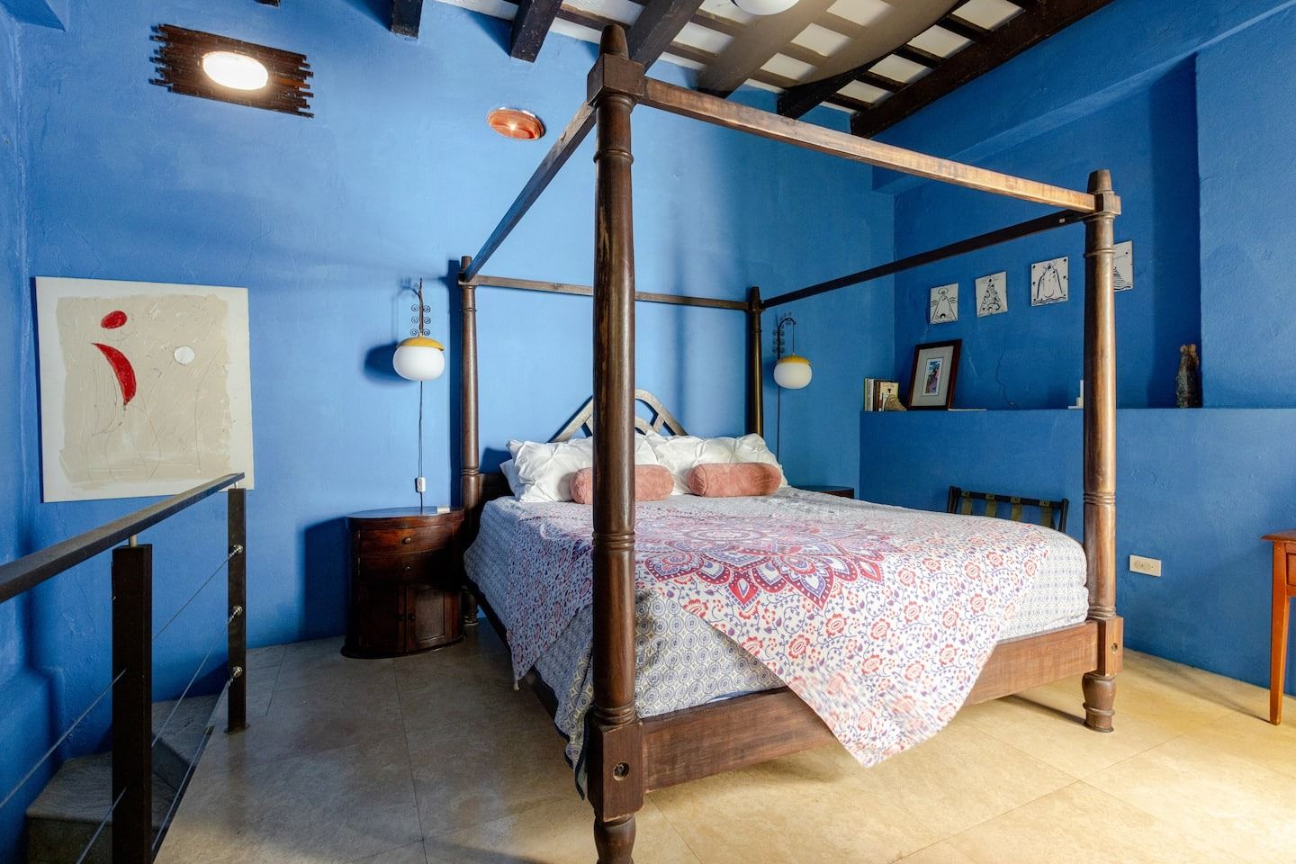 Image may contain indoor furniture, bed, bedroom, art painting and canopy bed