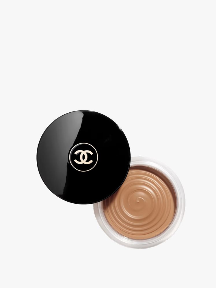 Image may contain: head, person, face, makeup, cup, hockey, ice puck, ice hockey rink, skating, sport and makeup