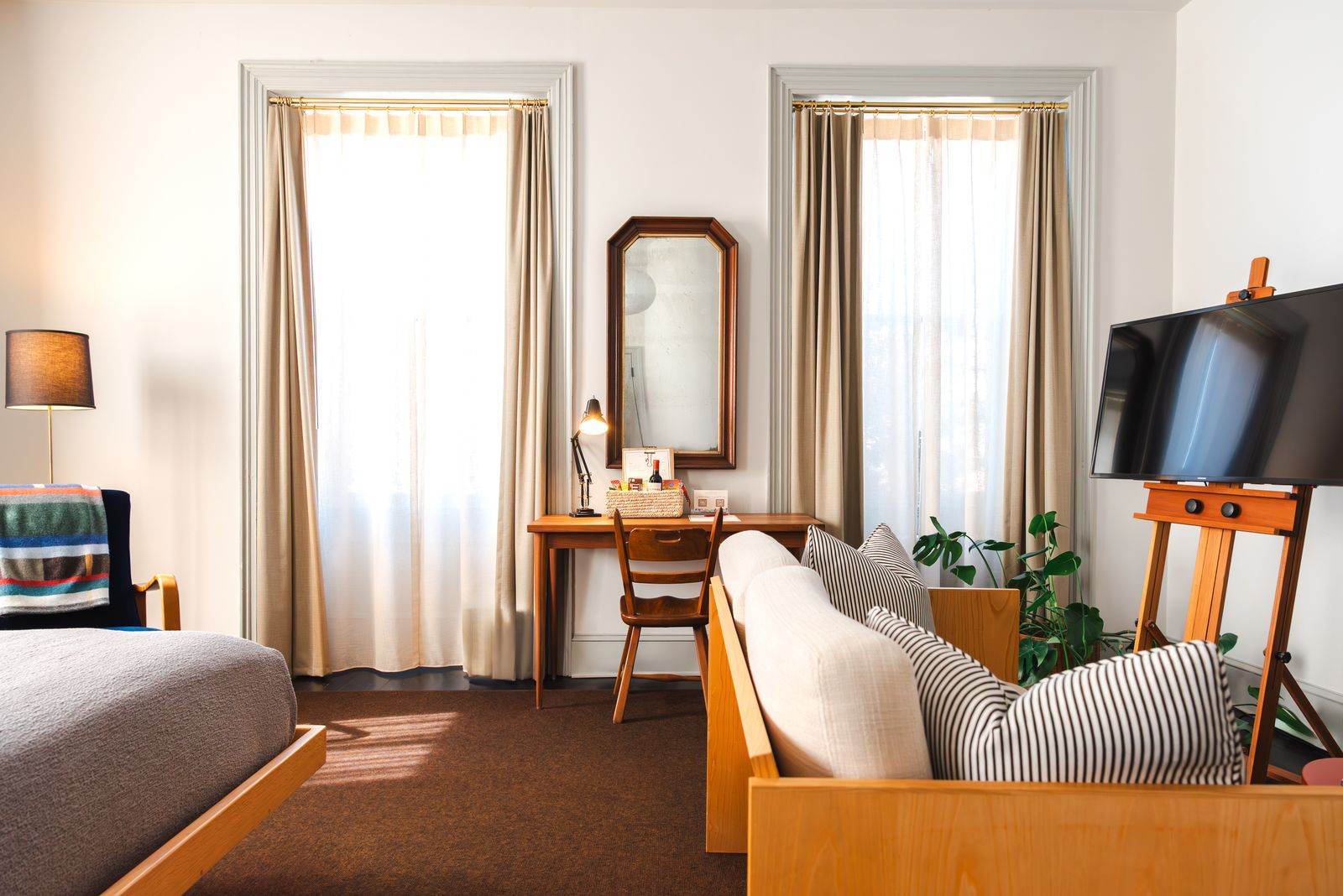 Image may contain architecture, architecture, furniture, interior living room, sofa, home decor, table and chairs