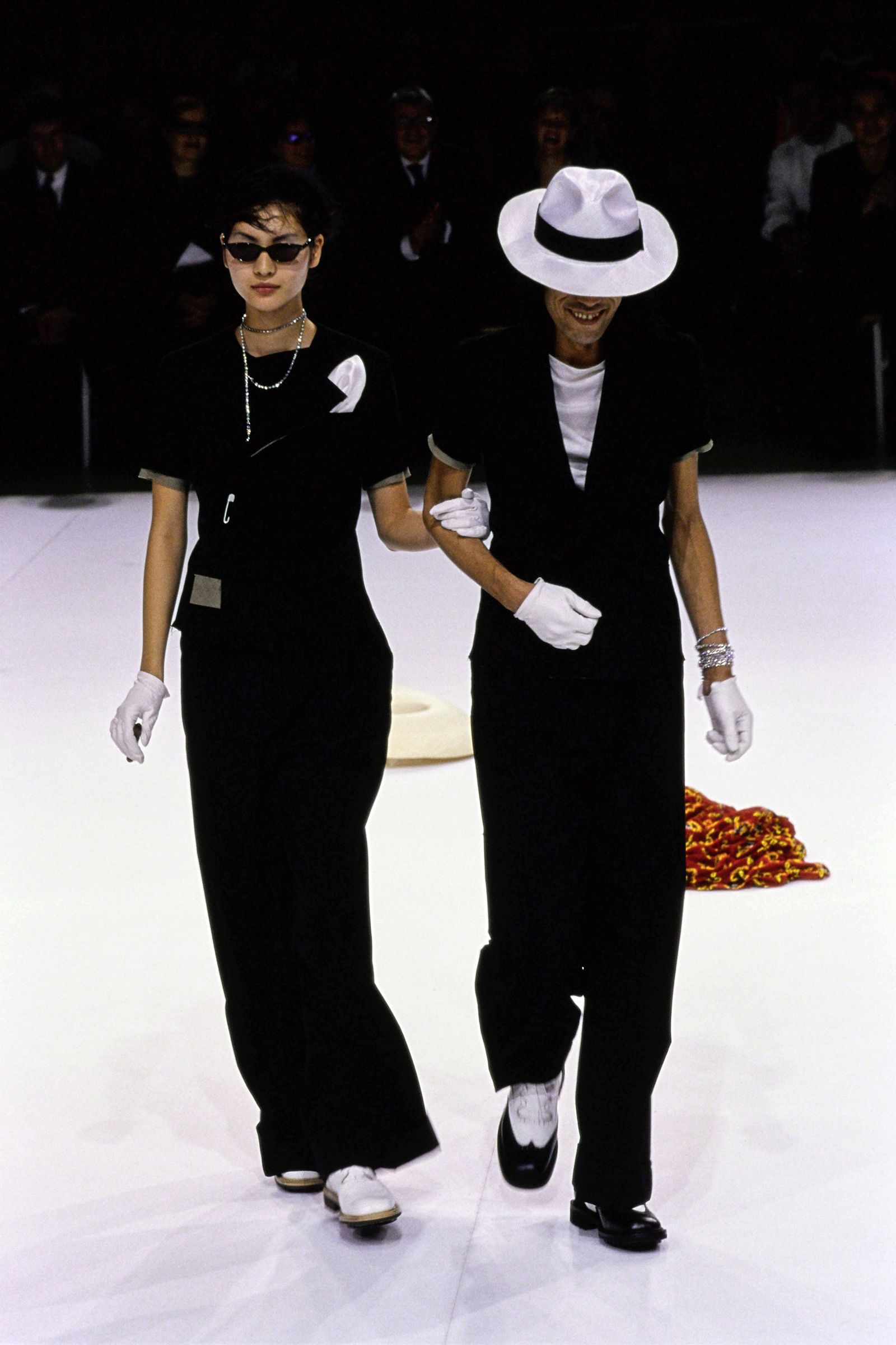 Image may contain hats, clothing, people, sunglasses, accessories, footwear and shoes