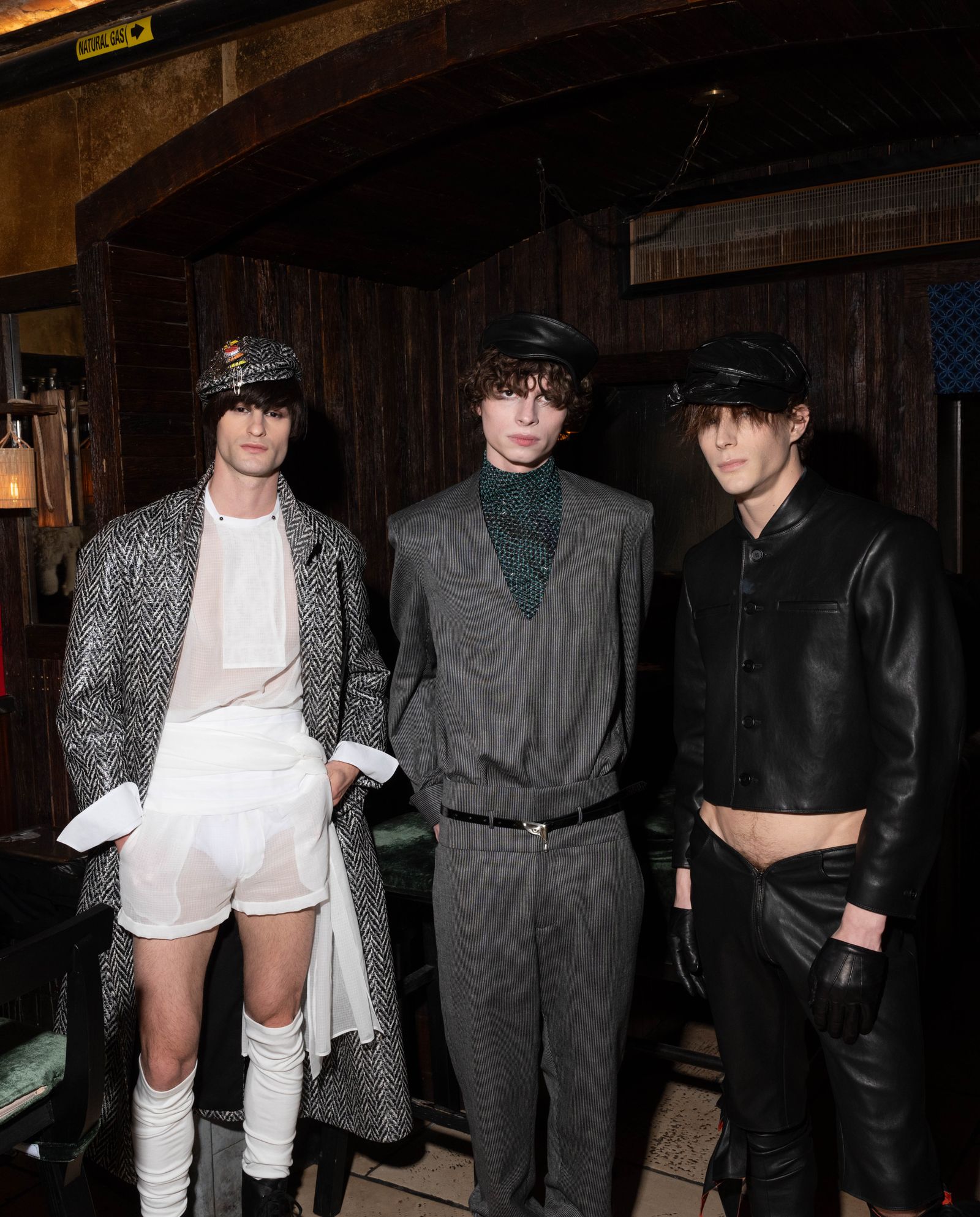 Image may contain clothing, coats, jackets, gloves, adult skirts, blazers, shorts, footwear, face and head