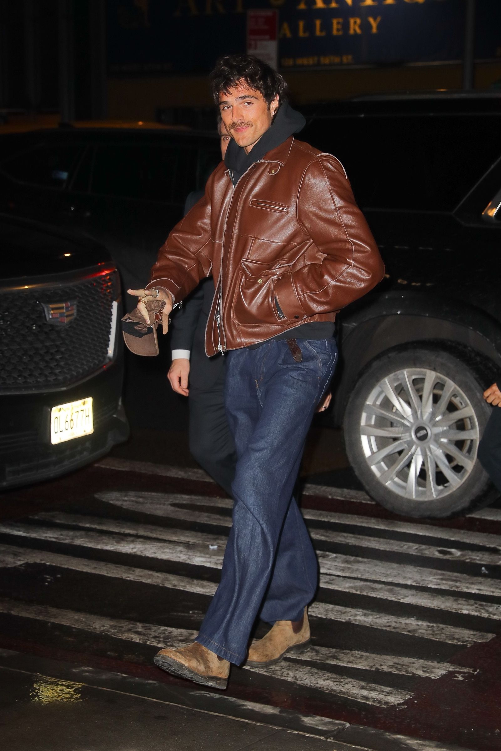 Image may contain Stuart Reardon Clothing Coats Jackets Pants Adult Wheel Jeans Footwear and Shoes