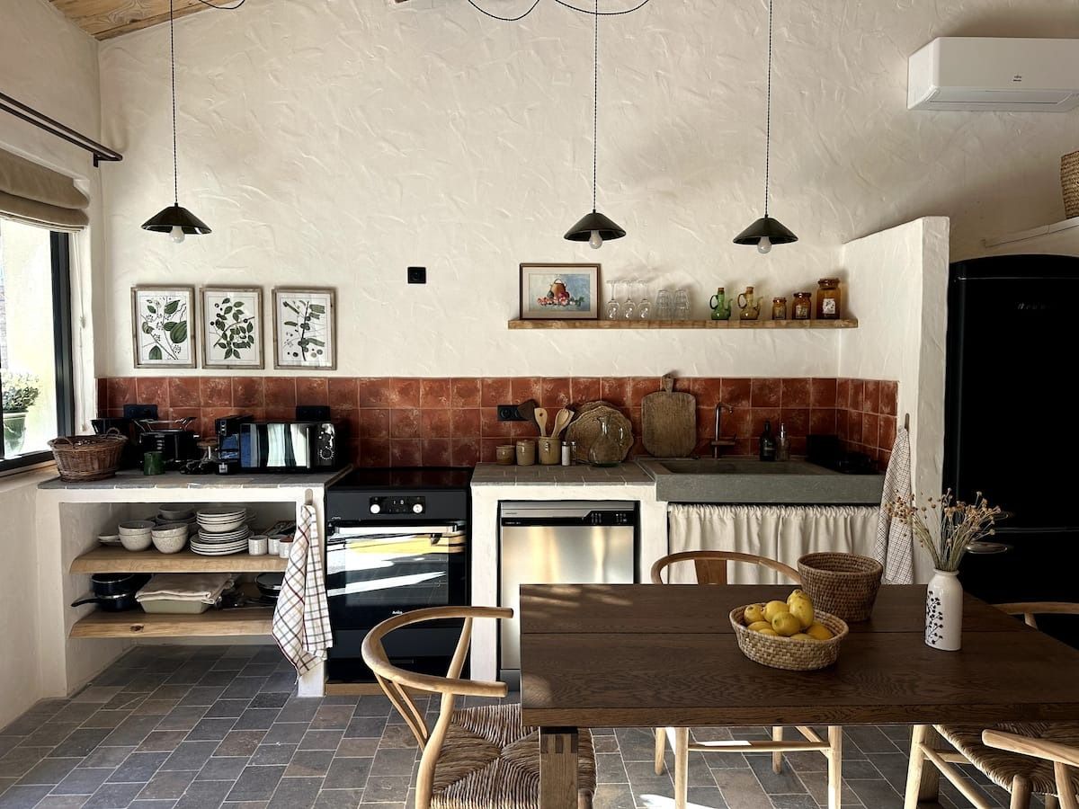 The image may contain interior interior design architecture architecture restaurant dining table furniture room and table