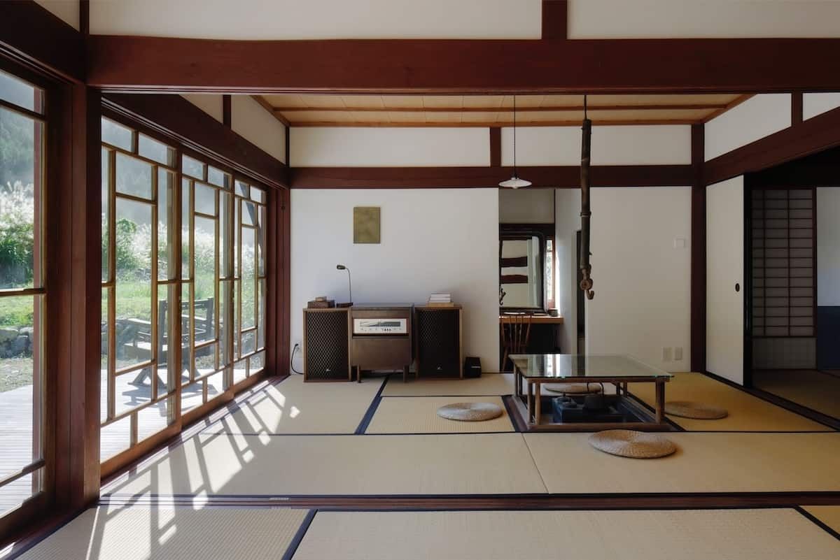 The image may contain interior interior design floor lamp architecture architecture furniture living room and room